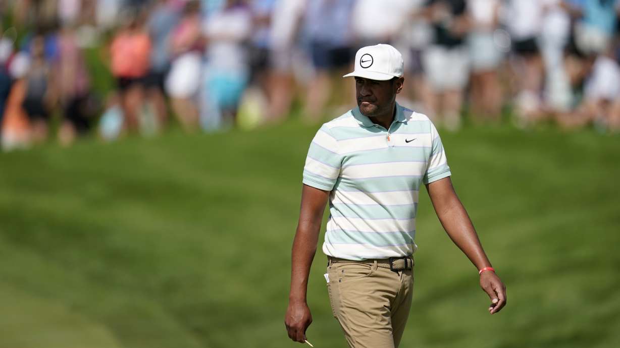 Tony Finau walks onto the 16th green during the final round of the 3M Open golf tournament at the Tournament Players Club in Blaine, Minn., Sunday, July 24, 2022.