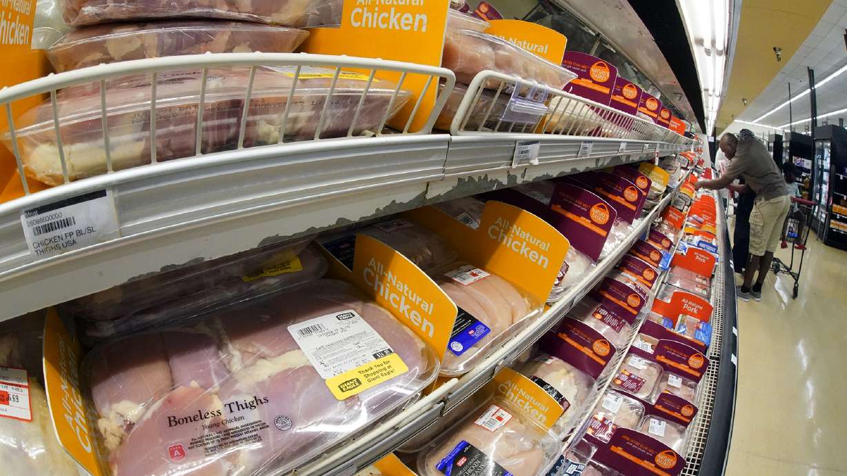 Chicken is on display in a market in Pittsburgh, July 12. The Justice Department is expected to file a lawsuit and proposed settlement against some of the largest poultry producers in the U.S. It's part of an effort to end what the government claims have been longstanding deceptive and abusive practices for workers.