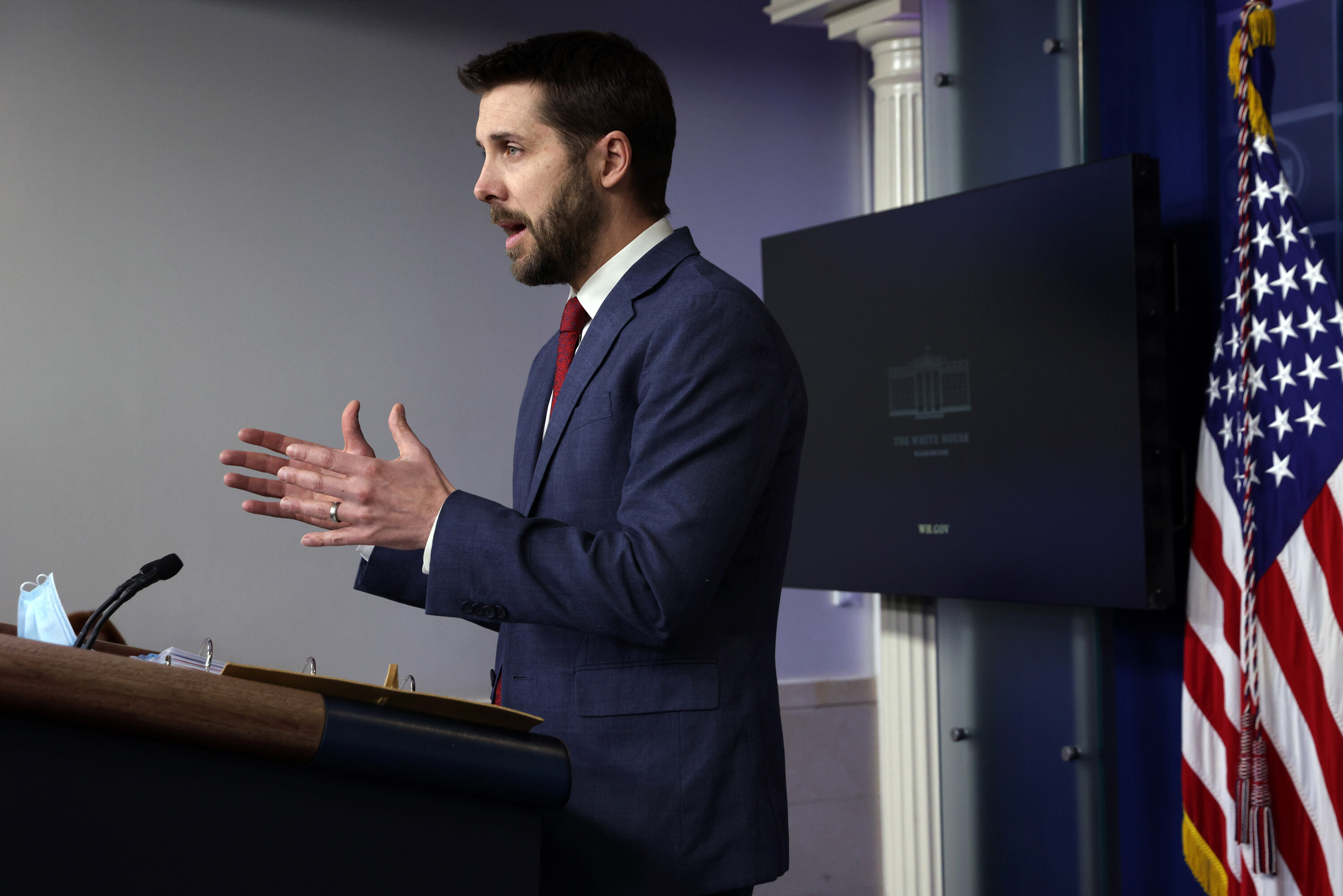 National Economic Council Director Brian Deese speaks during a White House news briefing in January 2021. President Joe Biden's advisers are downplaying recession fears ahead of a highly anticipated report that could show the economy shrinking.