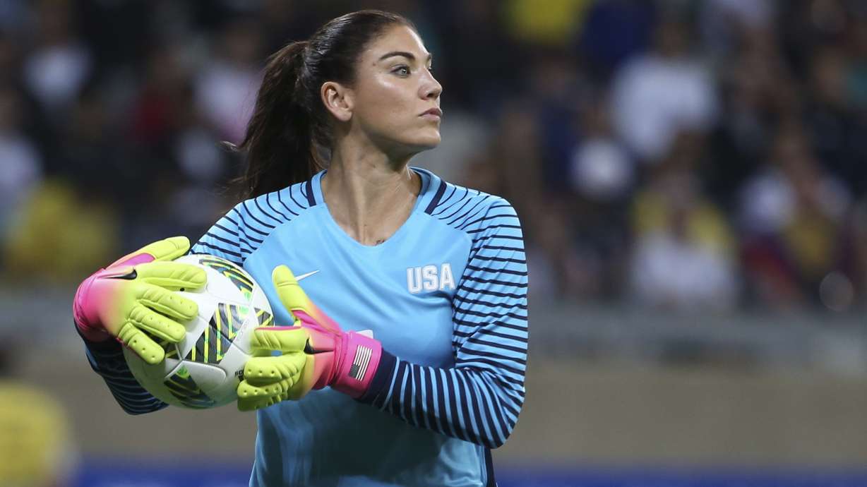 FILE - United States goalkeeper Hope Solo takes the ball during a women's soccer game at the Rio Olympics against New Zealand on Aug. 3, 2016, in Belo Horizonte, Brazil. Former women’s national team star Solo pleaded guilty Monday, July 25, 2022, to driving while impaired, almost four months after she was found passed out behind the wheel of a vehicle in North Carolina with her 2-year-old twins inside.