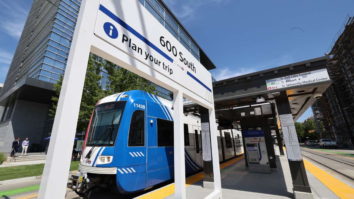 A train moves to a stop at the Utah Transit Authority TRAX station at 600 S. Main Street in Salt Lake City on Tuesday.