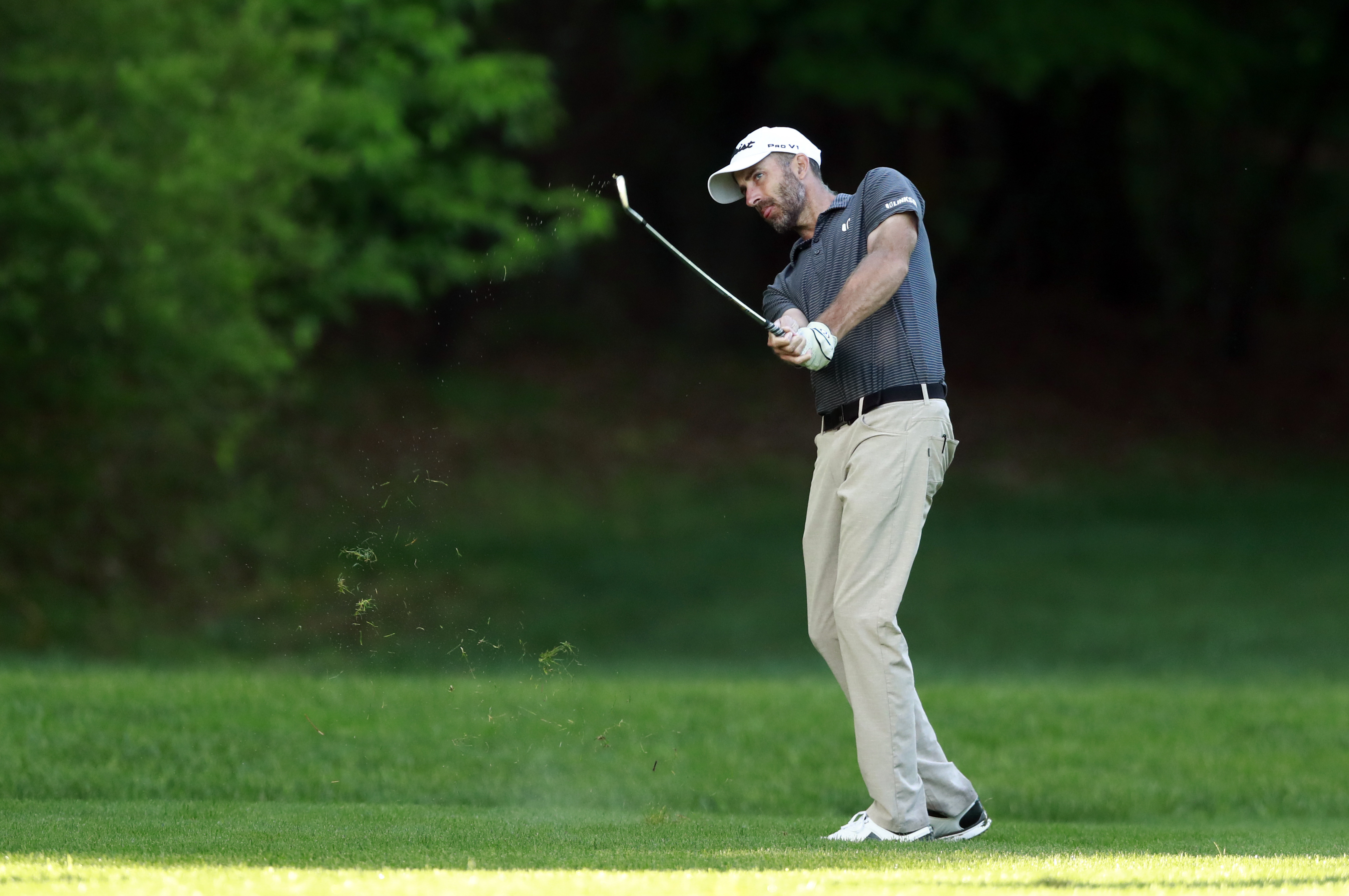 FILE - Geoff Ogilvy, of Australia, hits to the 12th hole during the second round of the Wells Fargo Championship golf tournament at Quail Hollow Club in Charlotte, N.C., on May 4, 2018. After a four-year absence, the former U.S. Open champion arrived in Detroit for this week's Rocket Mortgage Classic, his second PGA tour event in the last three weeks. 