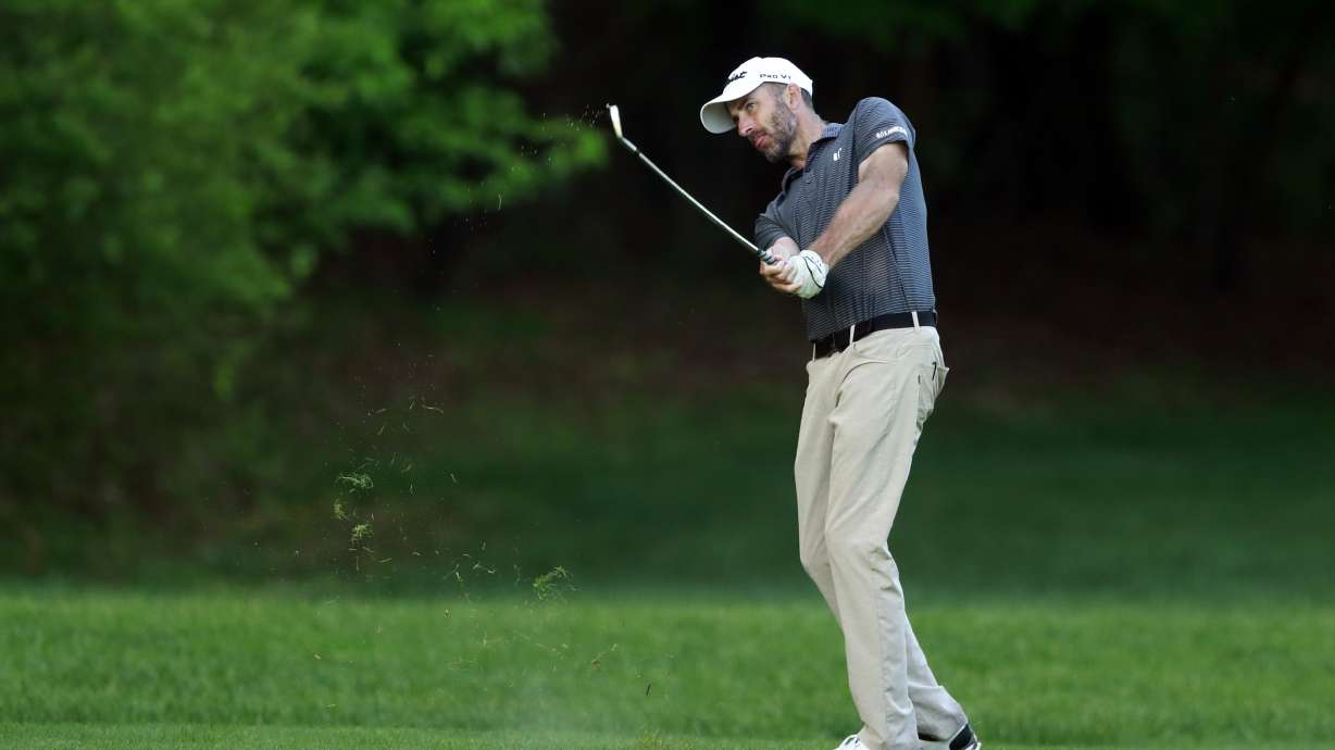 FILE - Geoff Ogilvy, of Australia, hits to the 12th hole during the second round of the Wells Fargo Championship golf tournament at Quail Hollow Club in Charlotte, N.C., on May 4, 2018. After a four-year absence, the former U.S. Open champion arrived in Detroit for this week's Rocket Mortgage Classic, his second PGA tour event in the last three weeks.