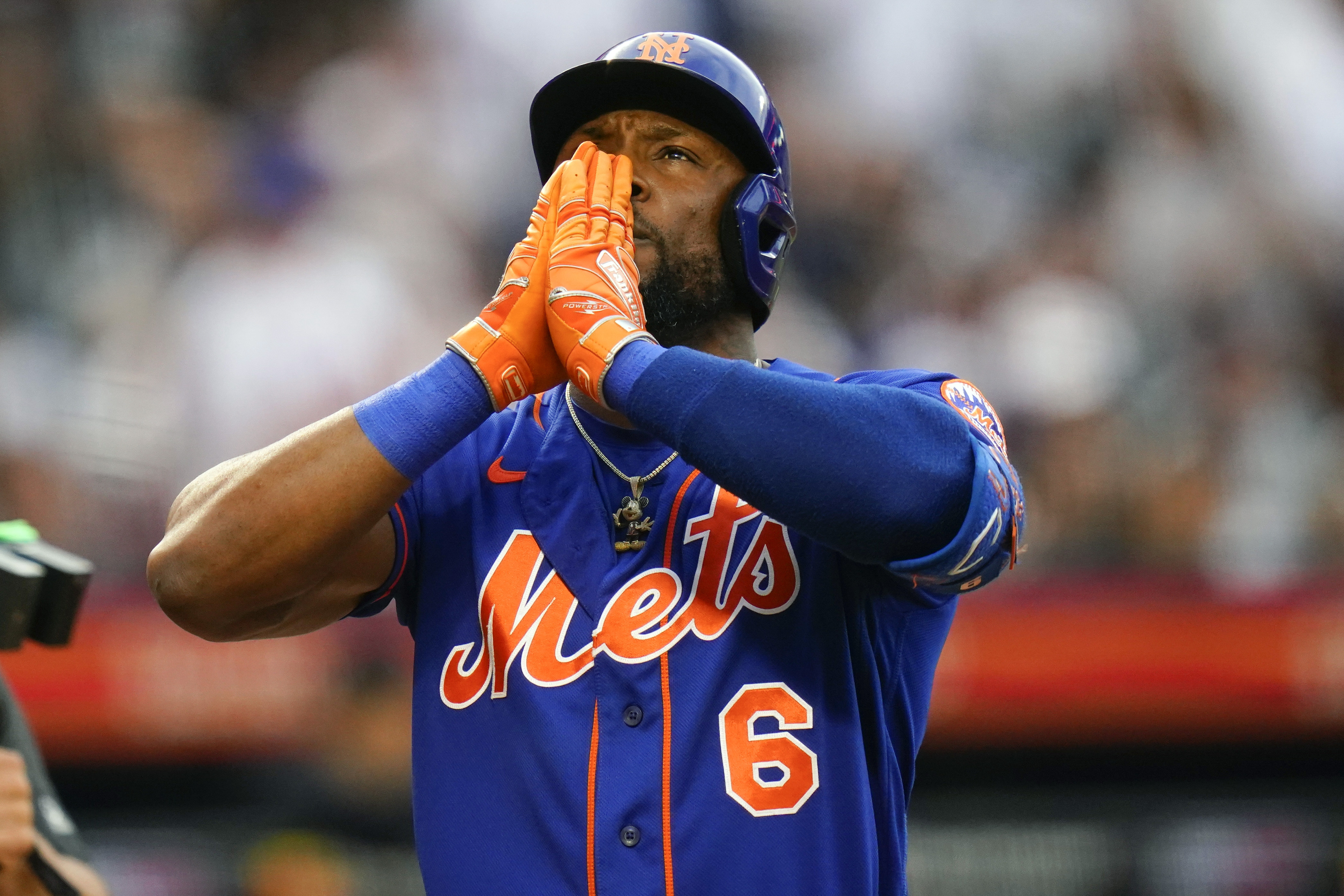 New York Mets' Starling Marte gestures after hitting a home run during the first inning of a baseball game against the New York Yankees Tuesday, July 26, 2022, in New York. 