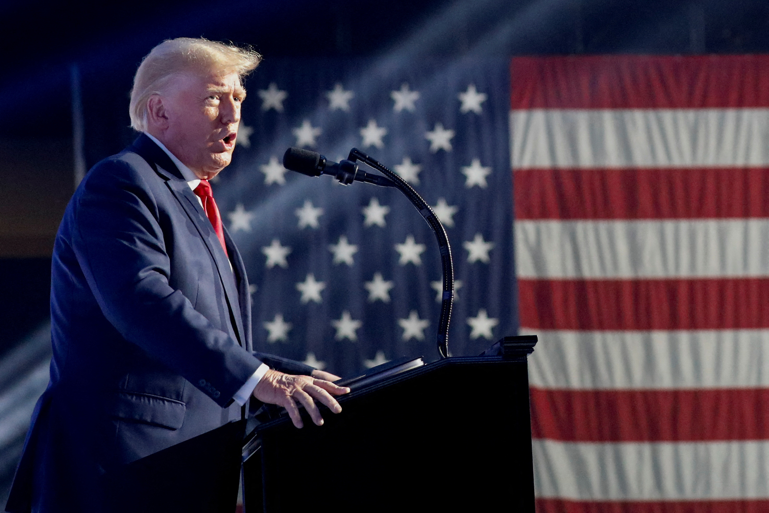 Former U.S. President Donald Trump speaks during the Turning Point USA's Student Action Summit in Tampa, Florida, Saturday.   Trump praised Utah Sen. Mike Lee and disparaged Lee's independent opponent Evan McMullin during a speech to young conservatives this past weekend.