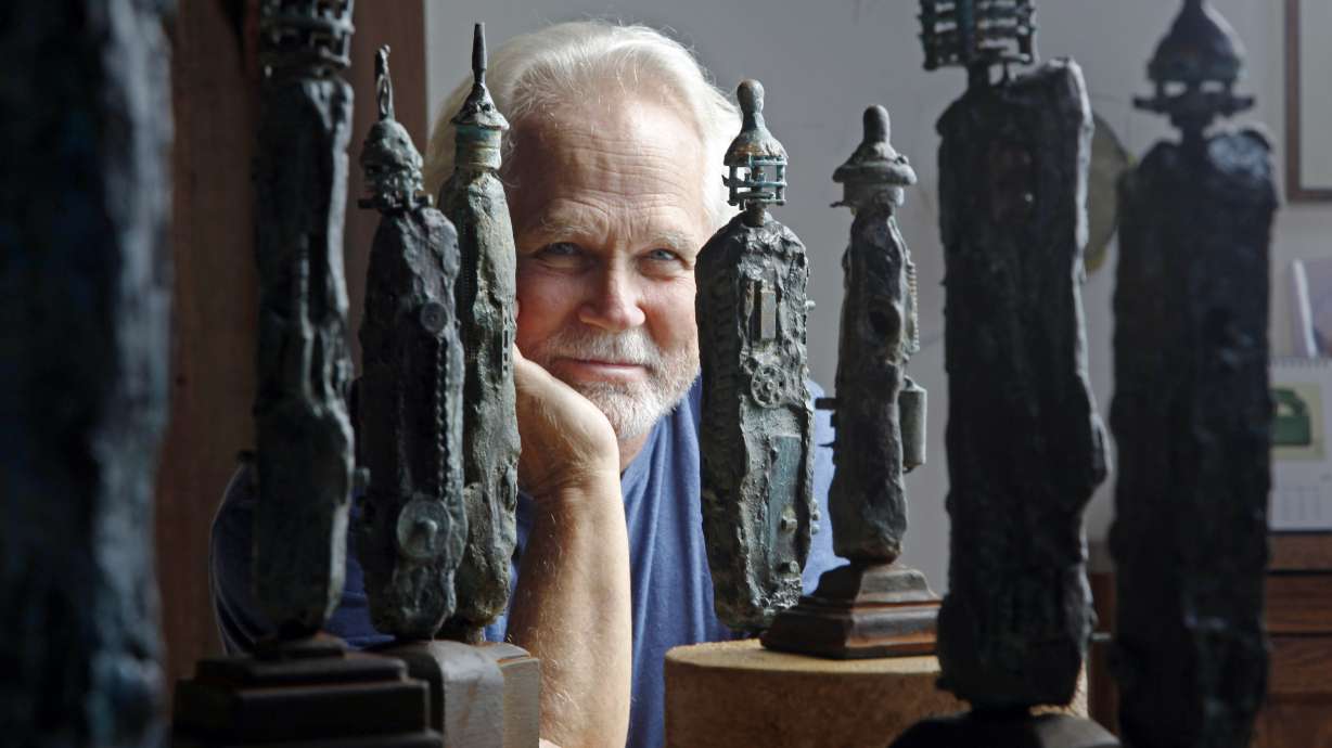 Tony Dow, actor, director and artist, poses with some of his works at his home and studio in the Topanga area of Los Angeles, Sept. 18, 2012. The “Leave It to Beaver” actor Dow has died at age 77. Frank Bilotta, who represented Dow in his work as a sculptor, confirmed his death in an email to the Associated Press on Wednesday.