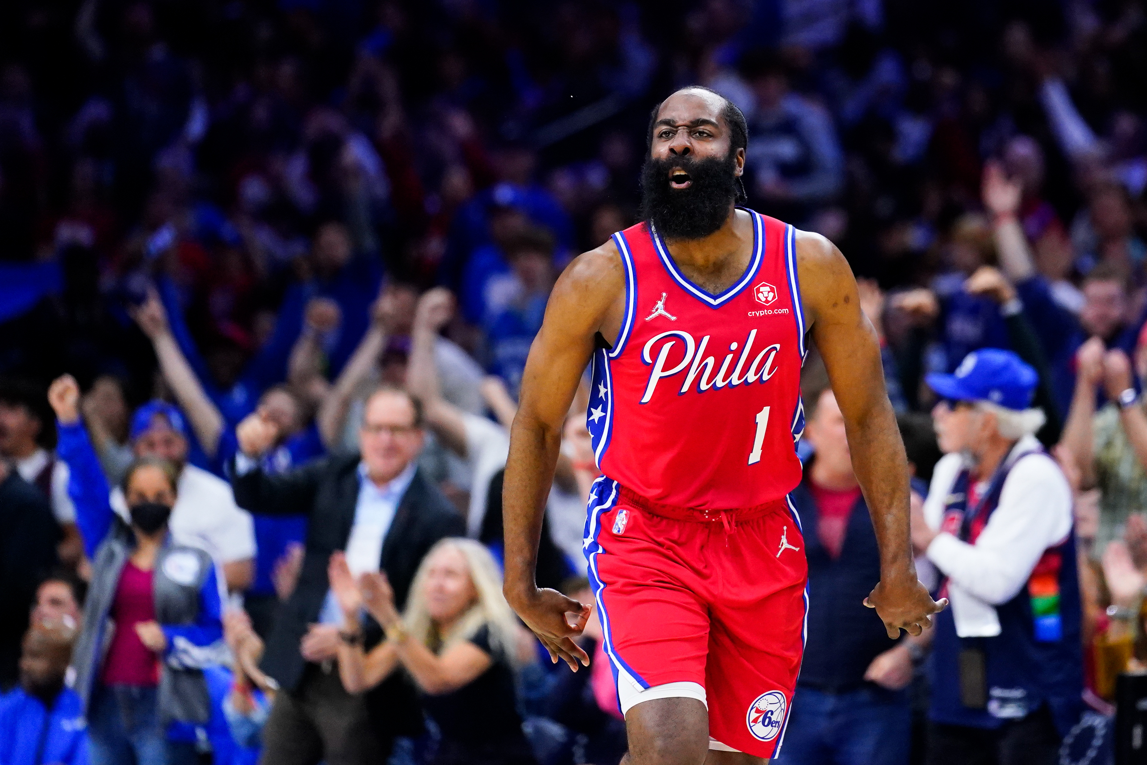 FILE - Philadelphia 76ers' James Harden reacts during the first half of Game 4 of an NBA basketball second-round playoff series against the Miami Heat on May 8, 2022, in Philadelphia. Harden has agreed to terms on a two-year contract to stay with the Philadelphia 76ers and will make about $14.5 million less this coming season than he could have earned under his previous deal, a person with knowledge of the negotiations said Wednesday, July 20. 