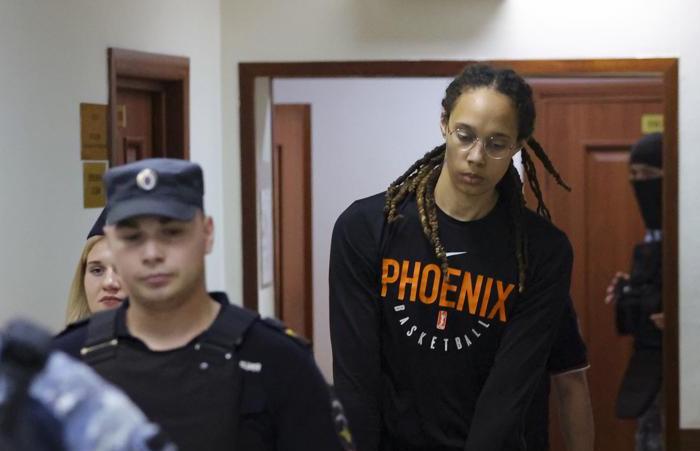 WNBA star and two-time Olympic gold medalist Brittney Griner is escorted to a courtroom for a hearing, in Khimki just outside Moscow, Russia, Wednesday. American basketball star Griner returned Wednesday to a Russian courtroom for her drawn-out trial on drug charges that could bring her 10 years in prison of convicted. 