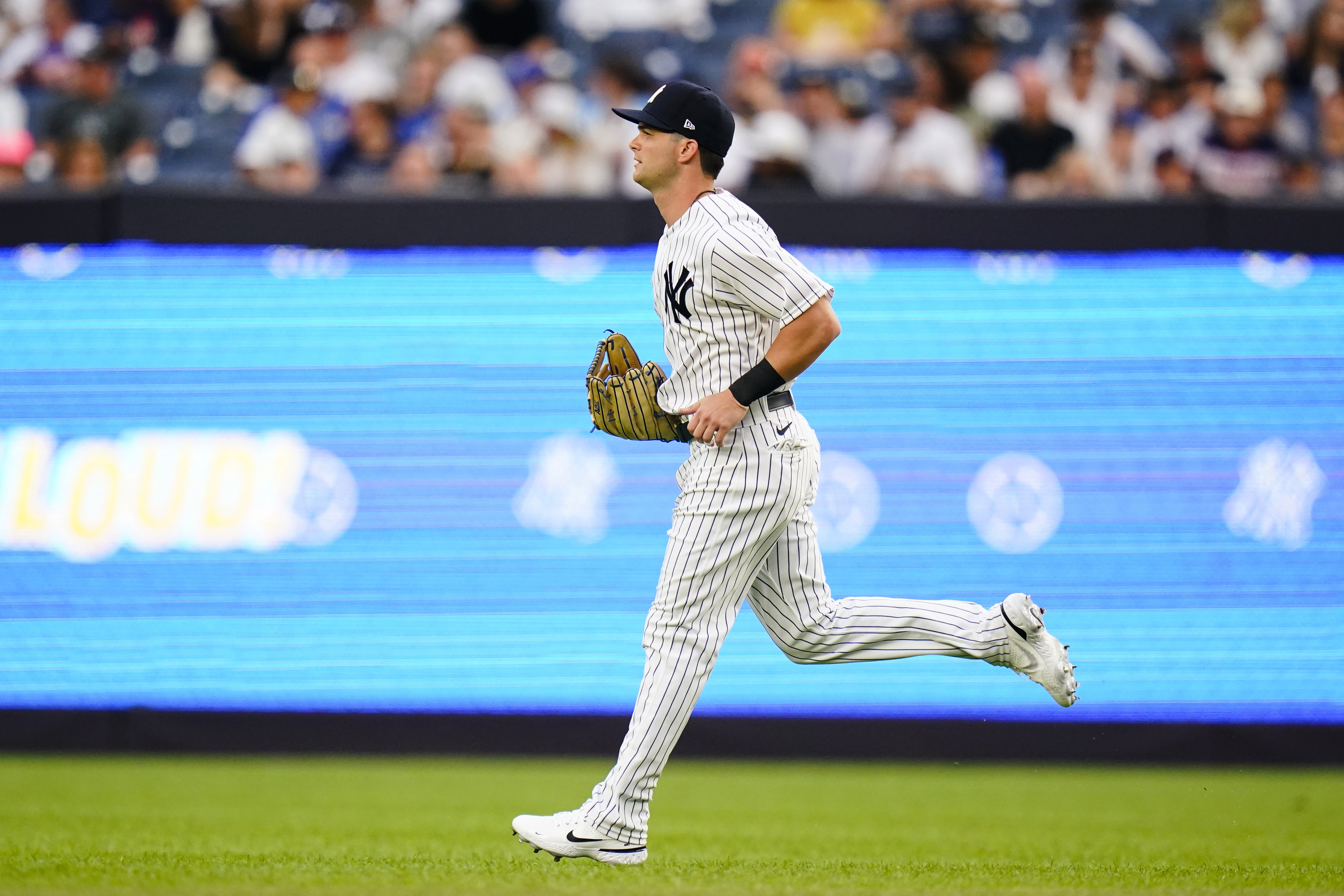 New York Yankees' Andrew Benintendi takes the field for the team's baseball game against his former team, the Kansas City Royals, Thursday, July 28, 2022, in New York. 