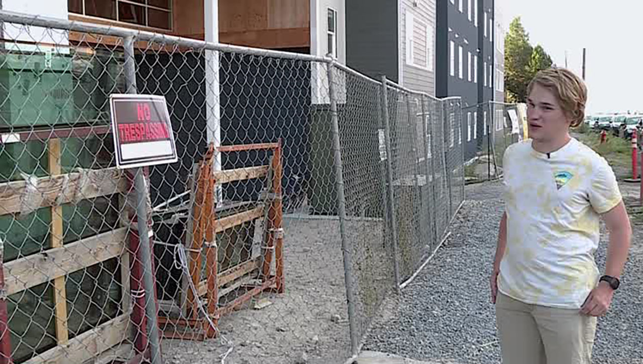 USU student Cole Duersch at the 800 Block apartments in Logan Thursday. He says he's looking for housing options after receiving a notice Wednesday night that 800 Block will not be ready by the move-in date of Aug. 27.