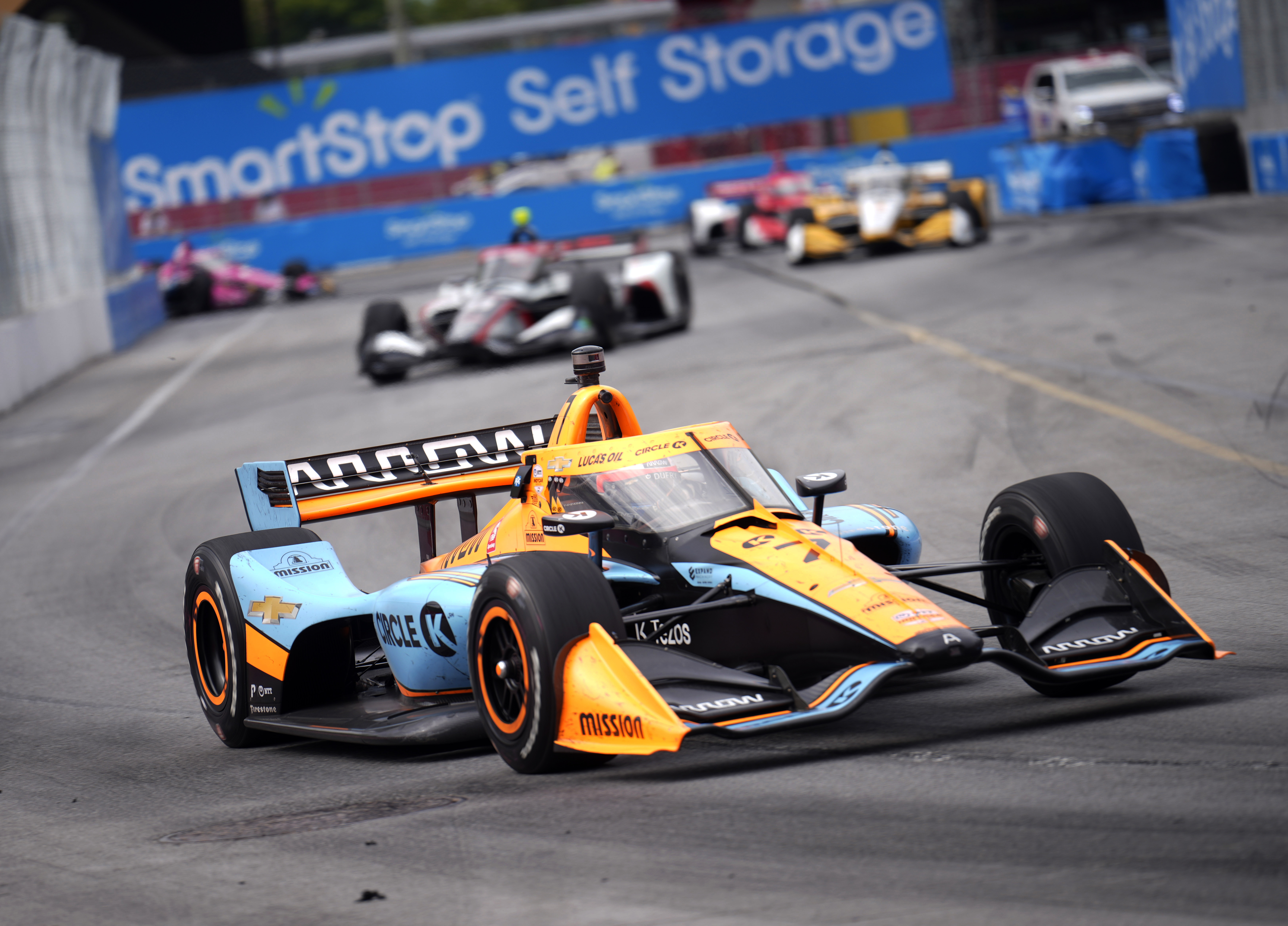 Felix Rosenqvist, of Sweden, races to a third place finish during an IndyCar auto race in Toronto, Sunday, July 17, 2022. 