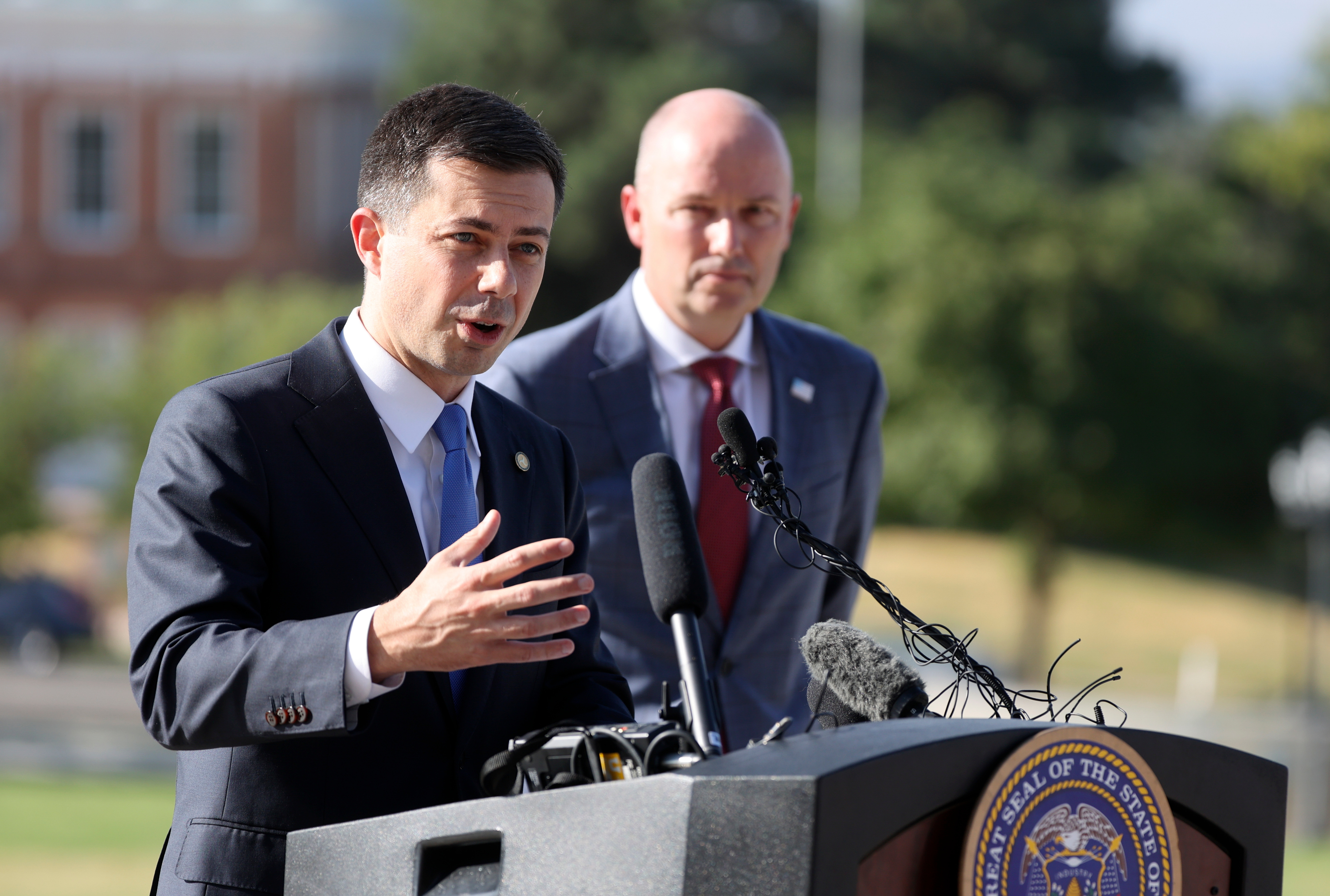 U.S. Secretary of Transportation Pete Buttigieg talks about new infrastructure projects to help build resilience to the impacts of extreme weather during a press conference with Gov. Spencer Cox outside of the Capitol in Salt Lake City on Friday.