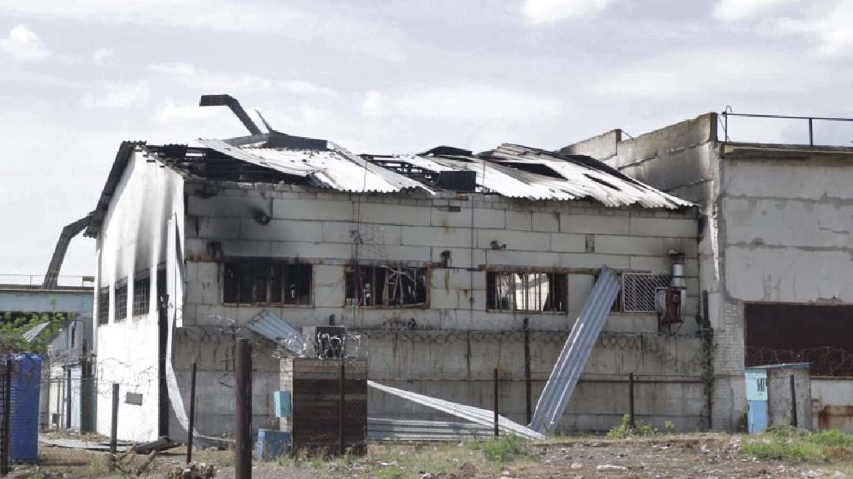 In this photo taken from video a view of a destroyed barrack at a prison in Olenivka, in an area controlled by Russian-backed separatist forces, eastern Ukraine, Friday. Russia and Ukraine accused each other Friday of shelling a prison in a separatist region of eastern Ukraine, an attack that reportedly killed dozens of Ukrainian military prisoners who were captured after the fall of a southern port city of Mariupol in May.