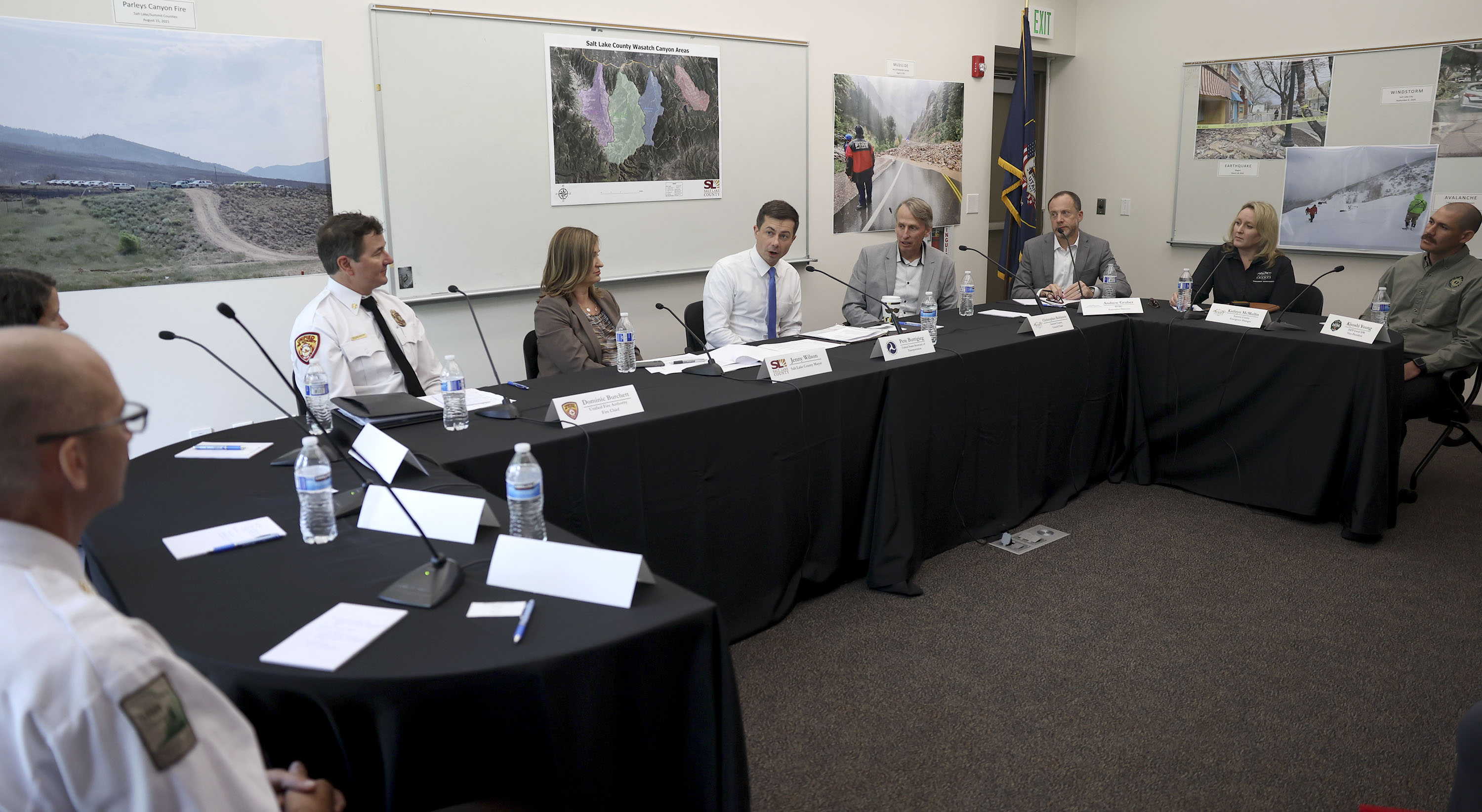 Transportation Secretary Pete Buttigieg speaks to Salt Lake City Mayor Jenny Wilson, Summit County Council Chairman Chris Robinson and Utah State DOT leaders during a roundtable with firefighters and community leaders at Unified Fire Authority Station 119 in Emigration Canyon on Friday.