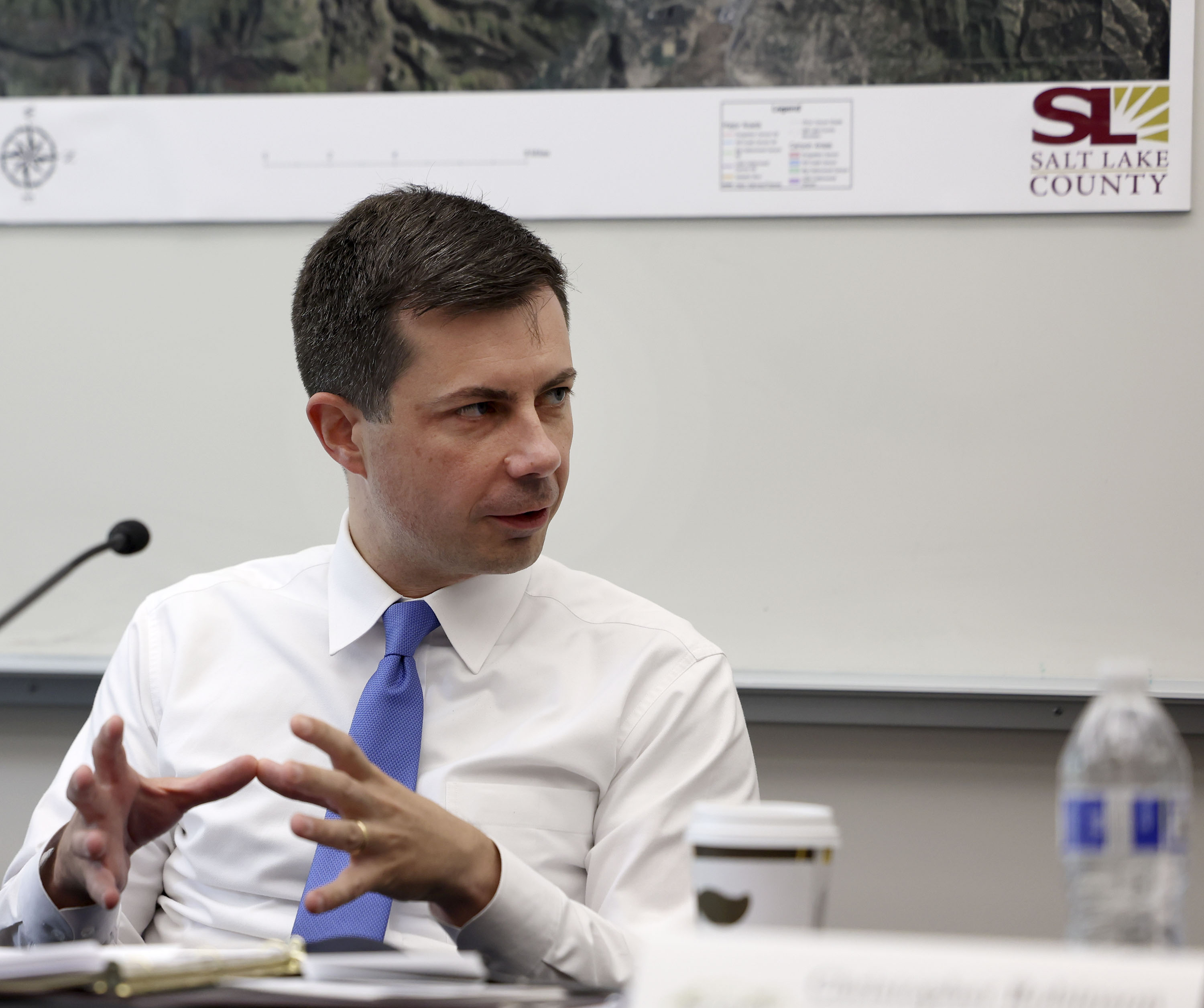 Transportation Secretary Pete Buttigieg speaks to Salt Lake City Mayor Jenny Wilson, Summit County Council Chairman Chris Robinson and Utah State DOT leaders during a roundtable with firefighters and community leaders at Unified Fire Authority Station 119 in Emigration Canyon on Friday.