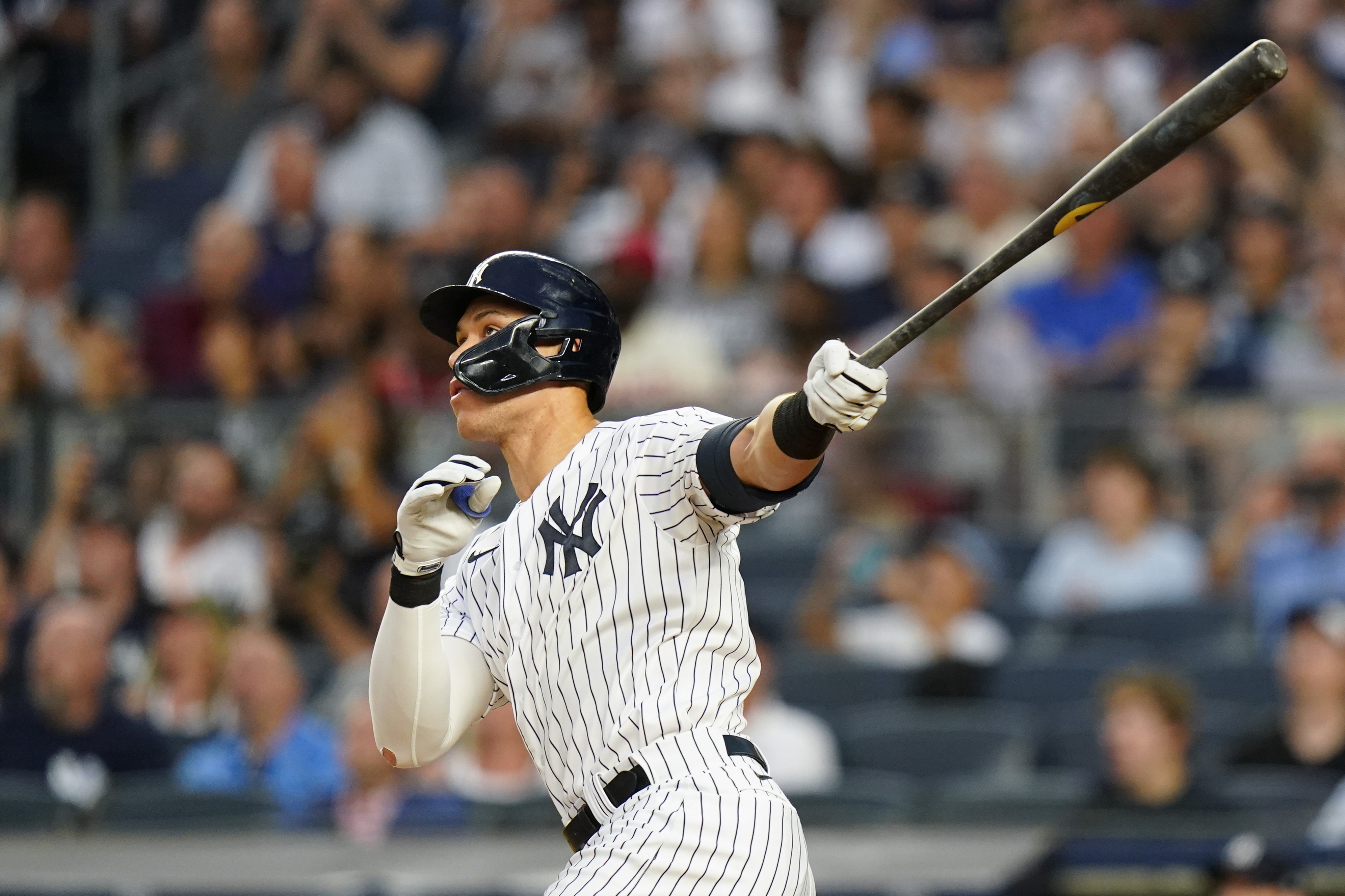 New York Yankees' Aaron Judge watches his two-run home run during the third inning of a baseball game against the Kansas City Royals, Friday, July 29, 2022, in New York. 