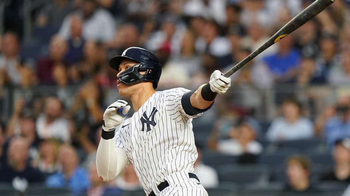 New York Yankees' Aaron Judge watches his two-run home run during the third inning of a baseball game against the Kansas City Royals, Friday, July 29, 2022, in New York.