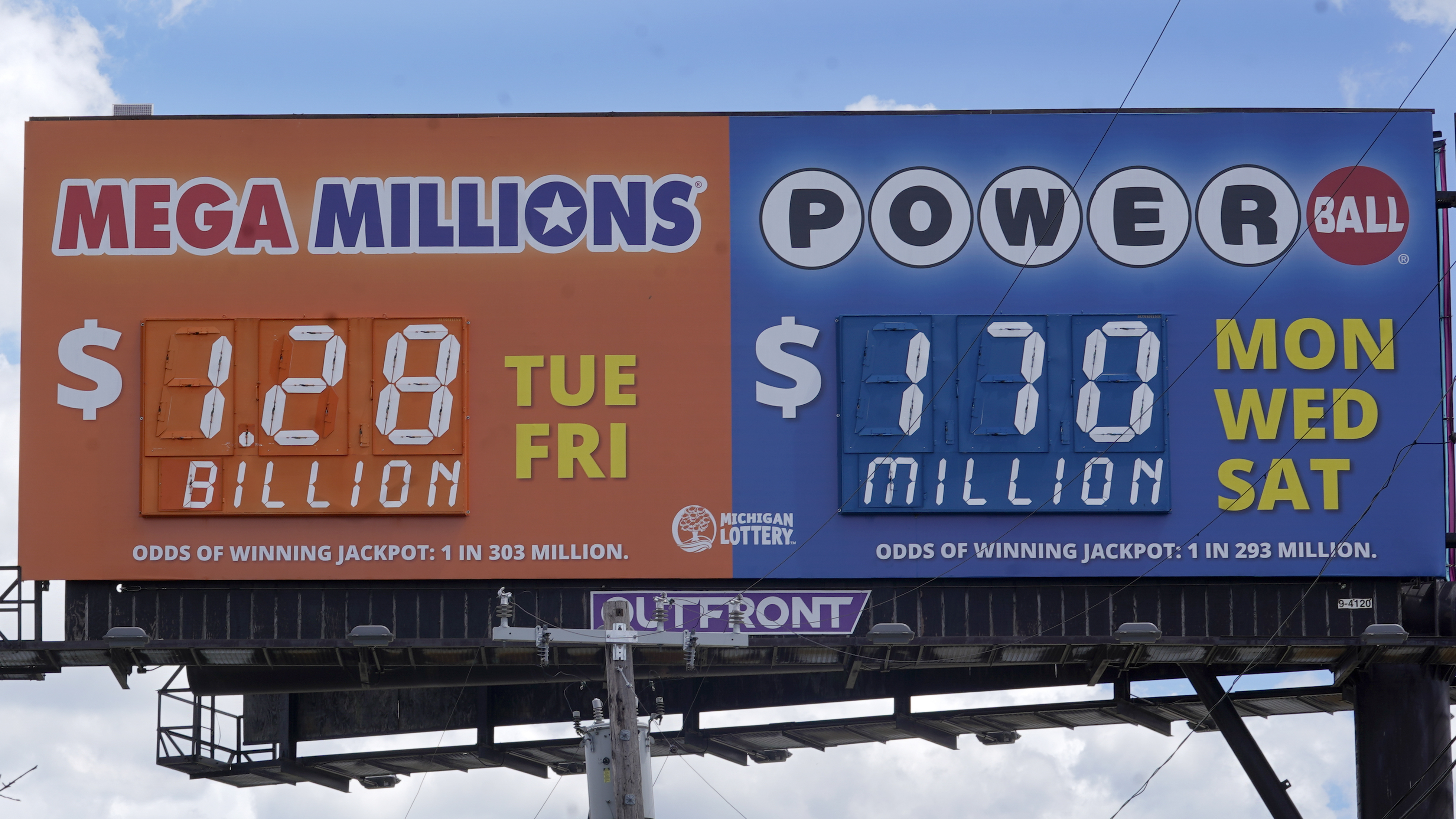 A sign displays the Mega Millions lottery jackpot in Detroit, Friday. Winning numbers were drawn Friday night.