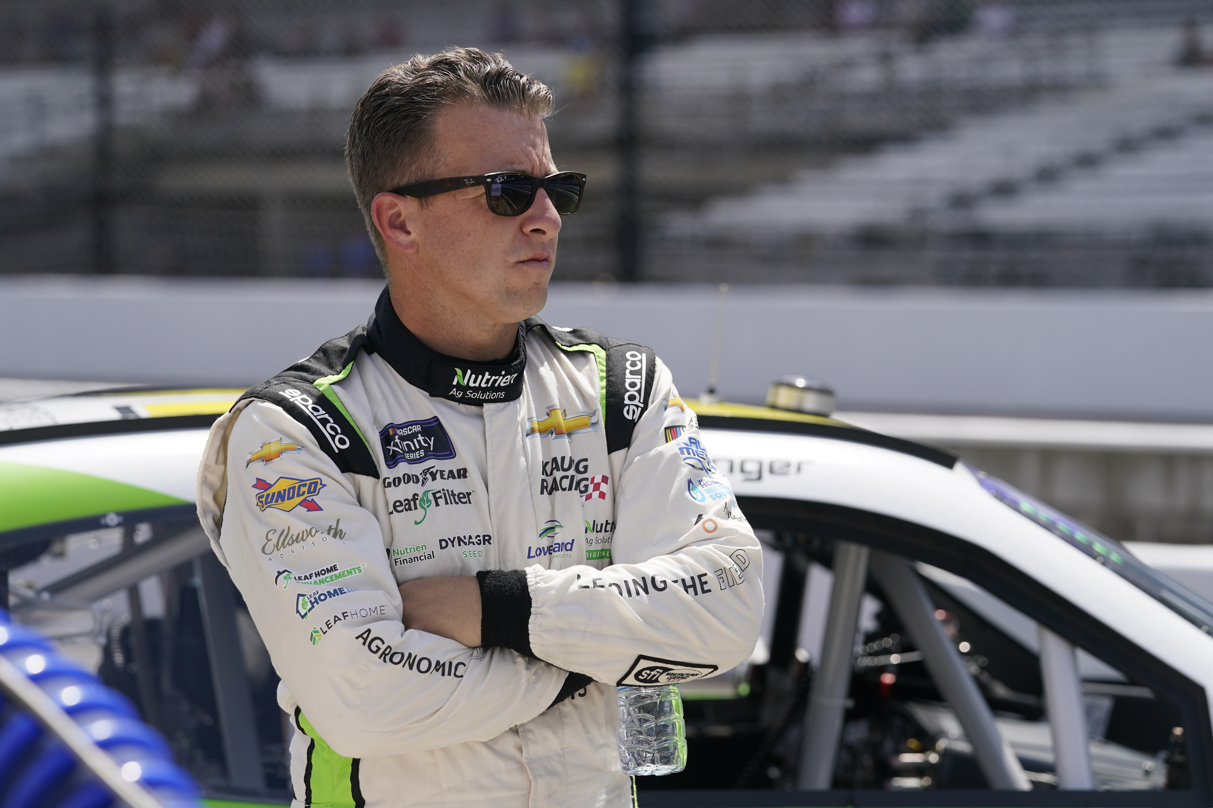 AJ Allmendinger looks on during qualifications for a NASCAR Xfinity Series auto race at Indianapolis Motor Speedway, Friday, July 29, 2022, in Indianapolis. 