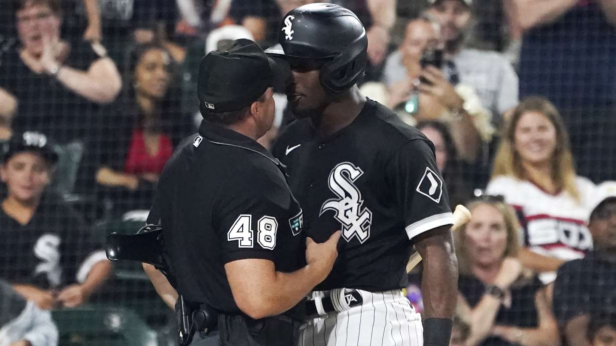 Chicago White Sox's Tim Anderson, right, gets in the face of home plate umpire Nick Mahrley after Anderson made contact with Mahrley during the seventh inning of a baseball game against the Oakland Athletics on Friday, July 29, 2022, in Chicago. Anderson was ejected.