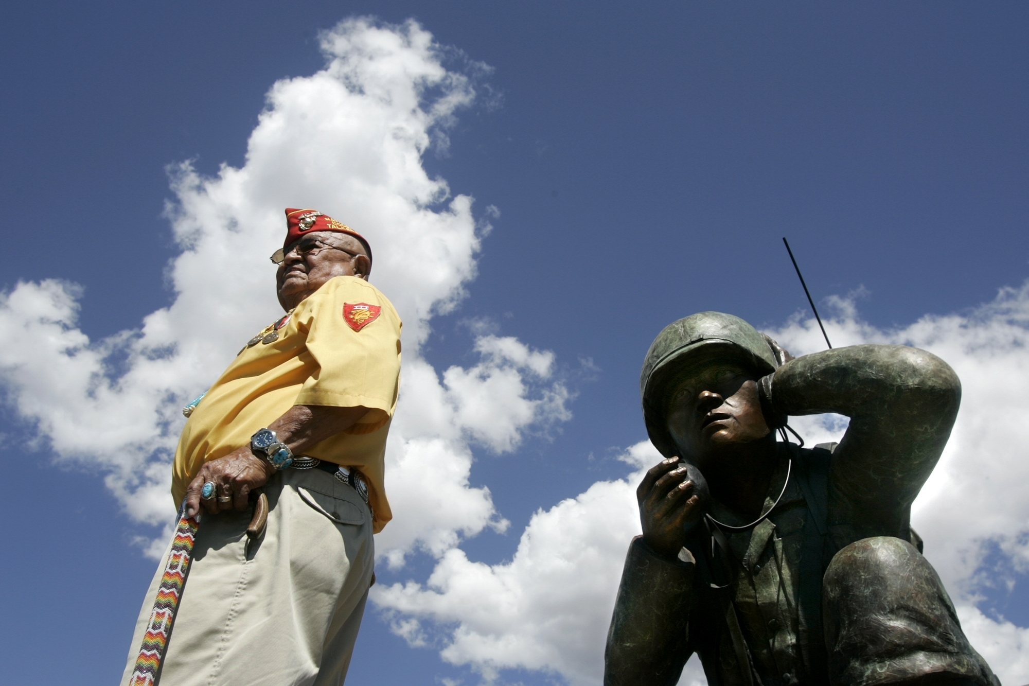 Navajo Code Talker Samuel Sandoval of Shiprock, N.M., poses for pictures on Sept. 8, 2004 during a ceremony where the Oreland C. Joe Code Talker sculpture was unveiled at the Navajo Nation Fairgrounds in Window Rock, Ariz. Sandoval died late Friday.