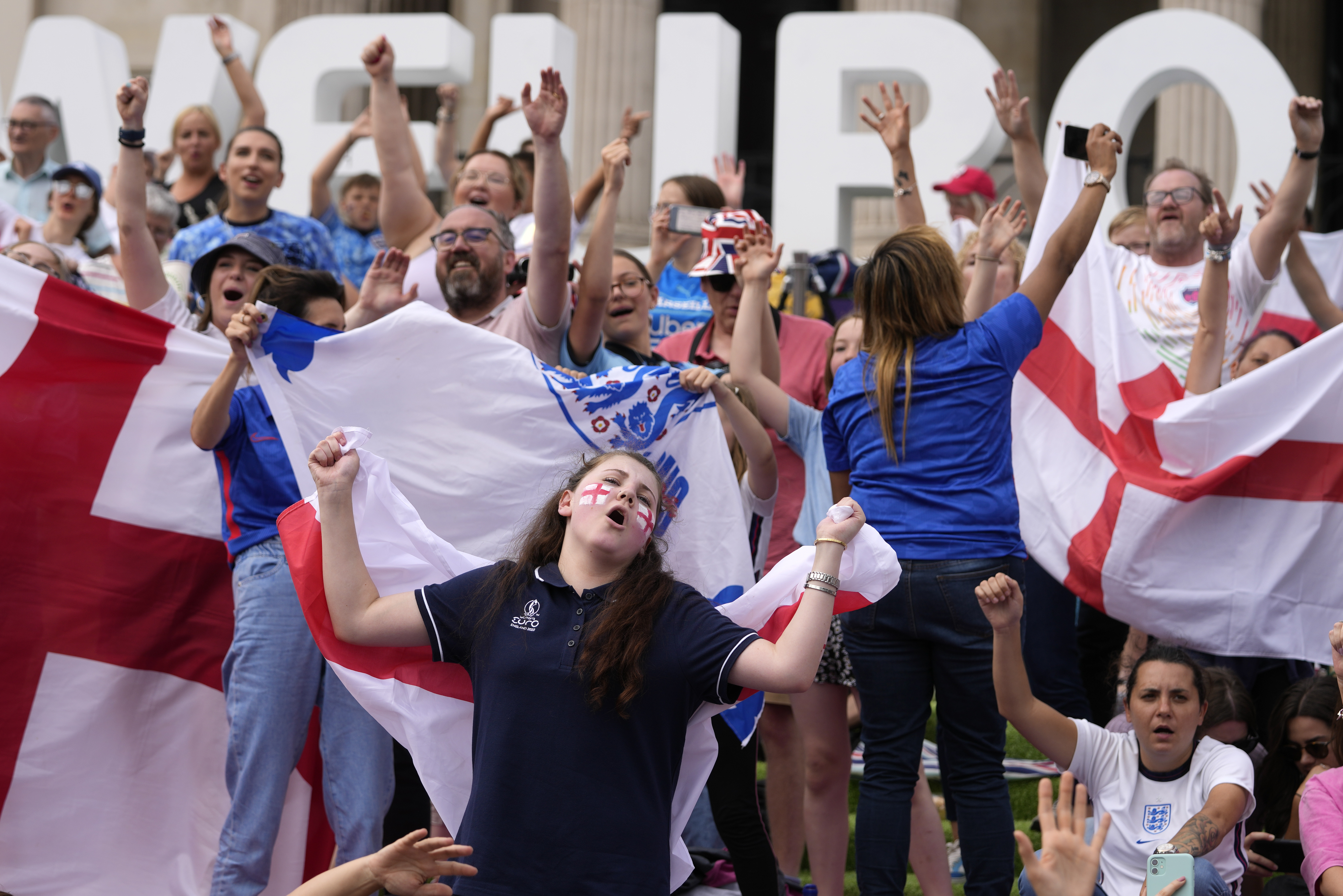 England supporters react as they gather in the fan zone in Trafalgar Square to watch on a big screen the final of the Women's Euro 2020 soccer match between England and Germany being played at Wembley stadium in London, Sunday, July 31, 2022. 