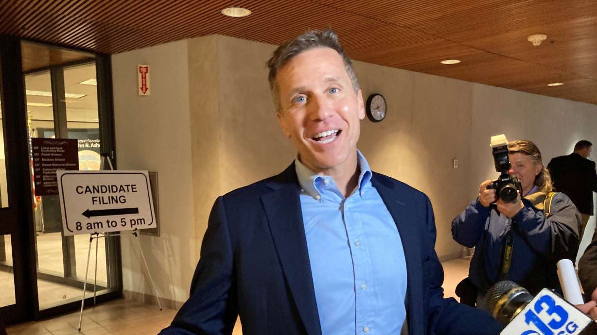 Former Missouri Gov. Eric Greitens gestures while speaking to reporters in Jefferson City Feb. 22. Greitens resigned as Missouri governor amid criminal charges and legislative investigations, is accused of abuse and bullying by his ex-wife and ran a widely condemned ad suggesting he was hunting members of his own party with a gun.