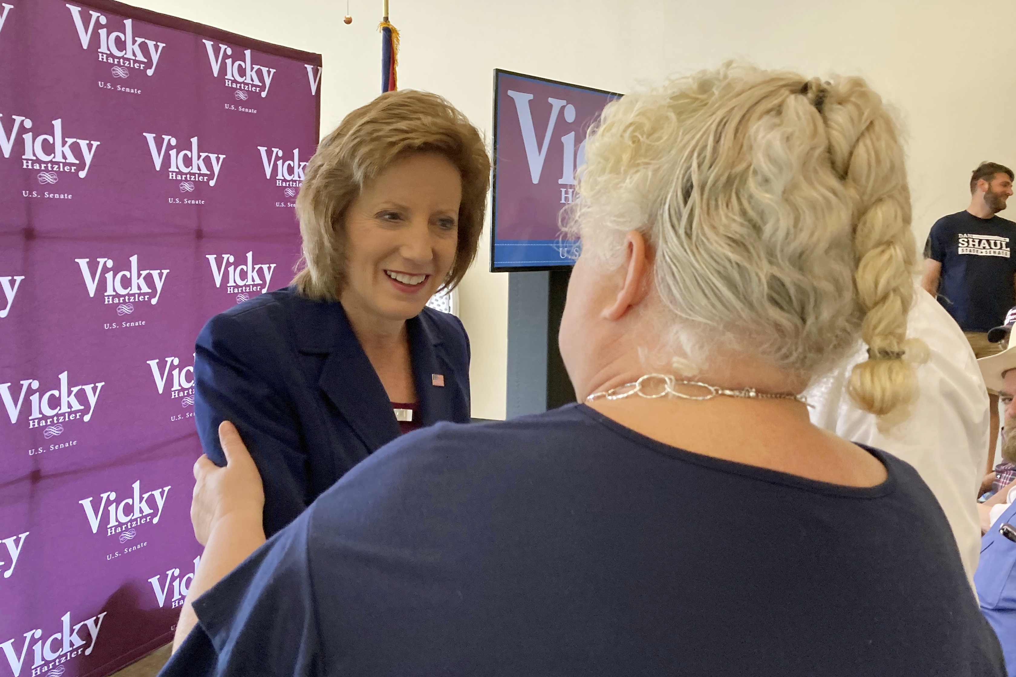 Rep. Vicky Hartzler, left, greets people during a campaign stop in Pevely, Mo., Thursday, July 28. Hartzler is among 21 Republicans running for a U.S. Senate seat in Missouri.