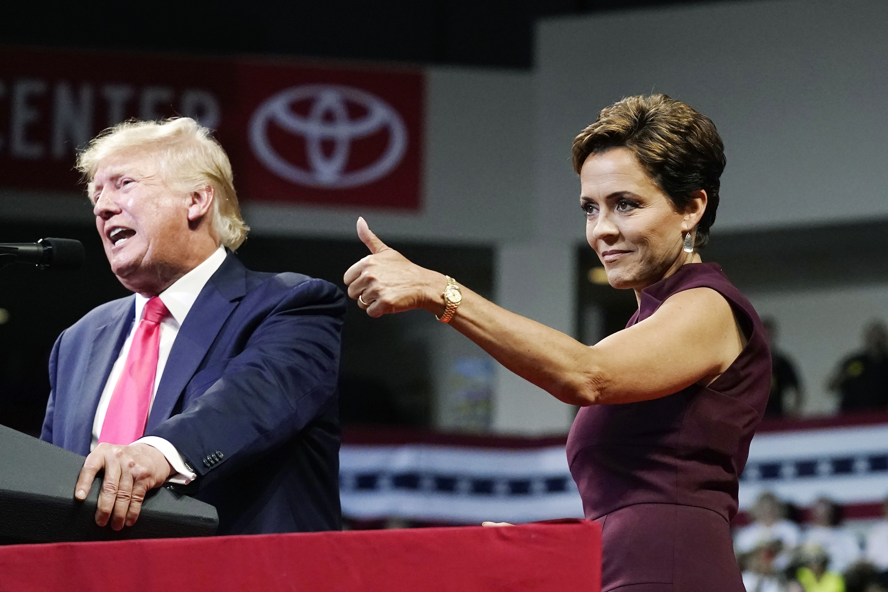 Arizona Republican candidate for governor, Kari Lake, gives a thumbs up to the crows as former President Donald Trump speaks at a Save America rally Friday, July 22, in Prescott, Ariz.