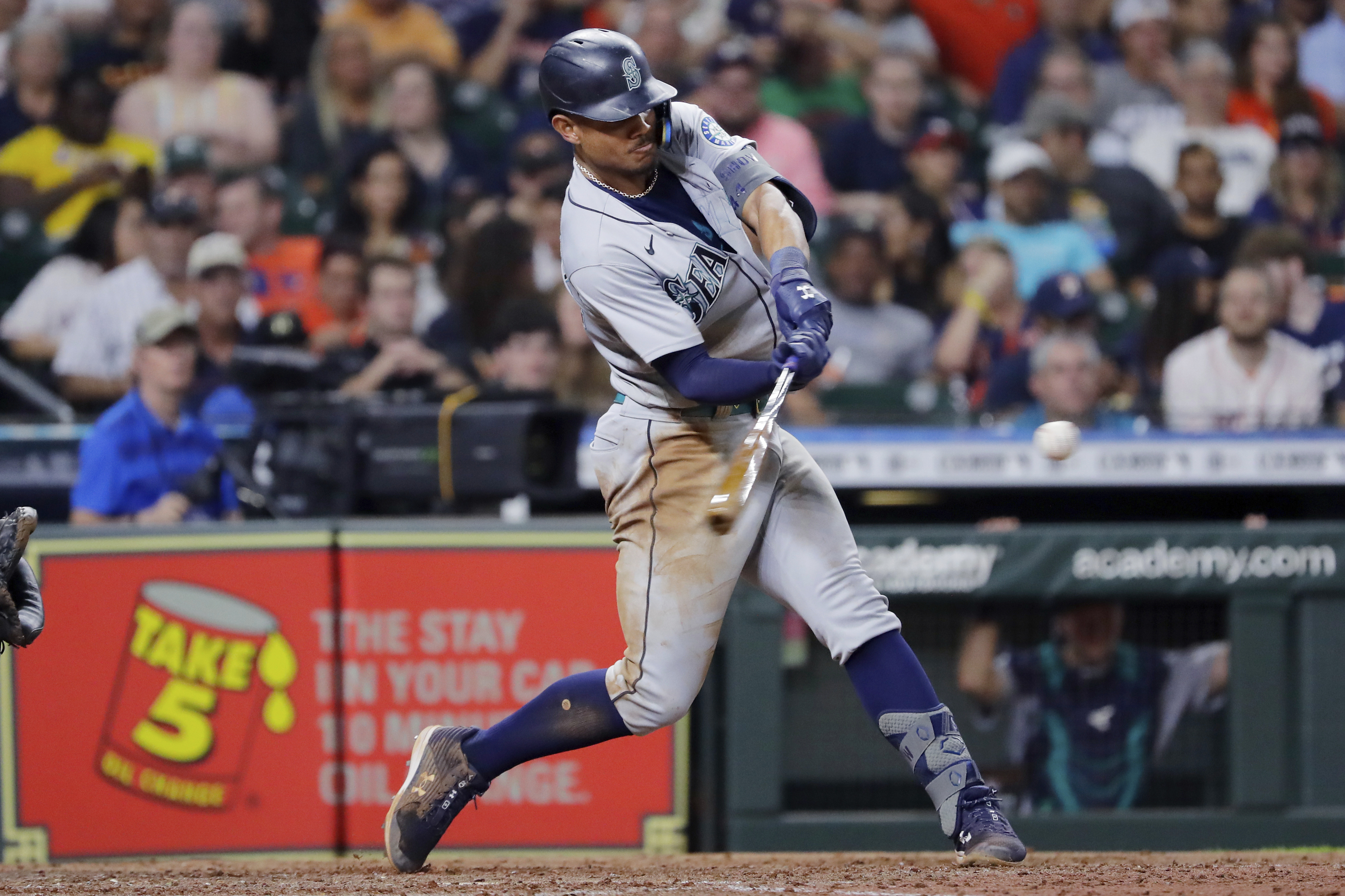 Seattle Mariners' Julio Rodriguez hits an RBI double against the Houston Astros during the eighth inning of a baseball game Friday, July 29, 2022, in Houston. 