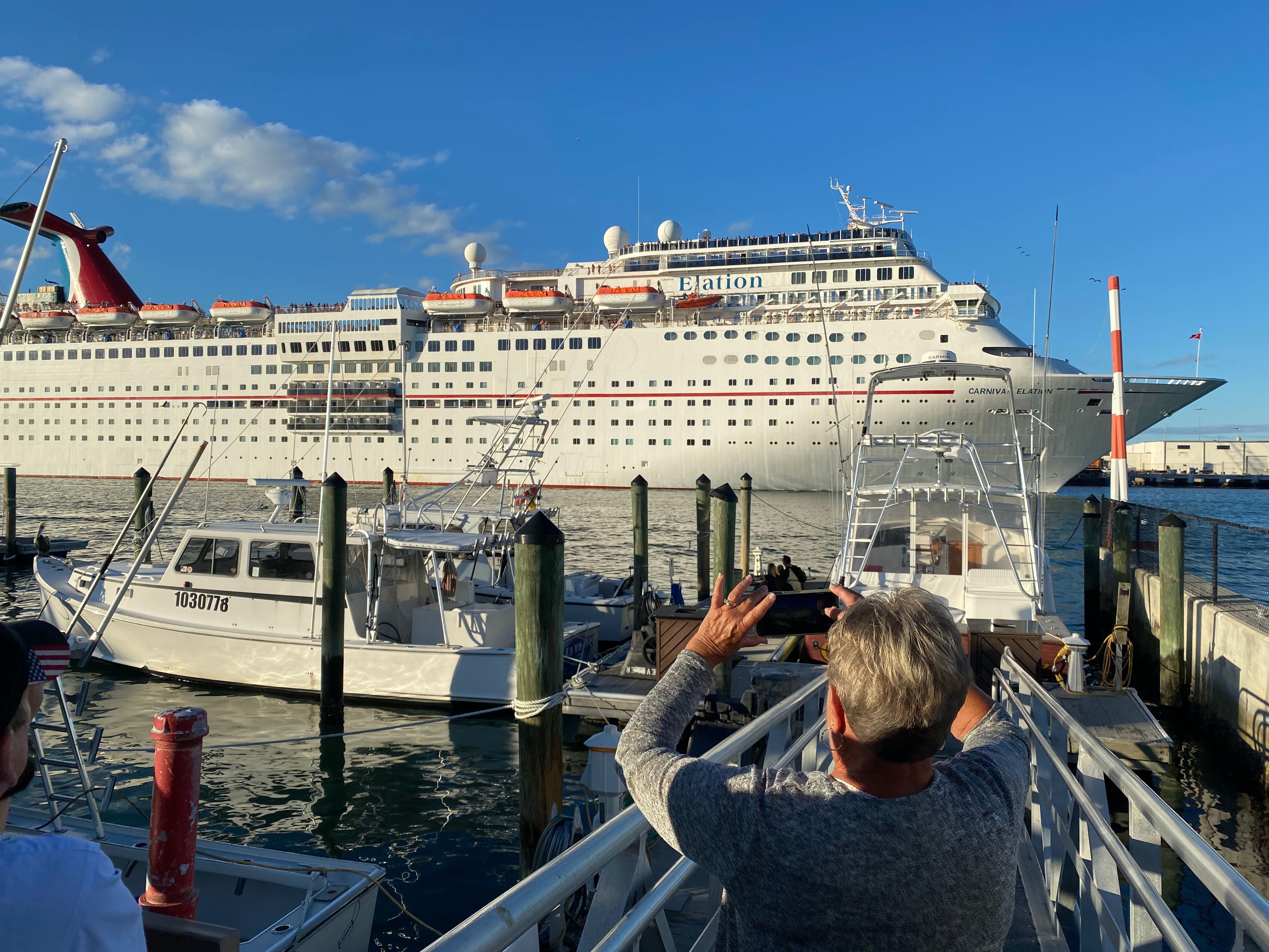Carnival Cruise Line’s Elation leaves Port Canaveral, in Cape Canaveral, Florida, Dec. 26, 2021. Royal Caribbean, Carnival and MSC cruise lines will be easing their pre-travel COVID-19 testing requirements for passengers starting this month. 