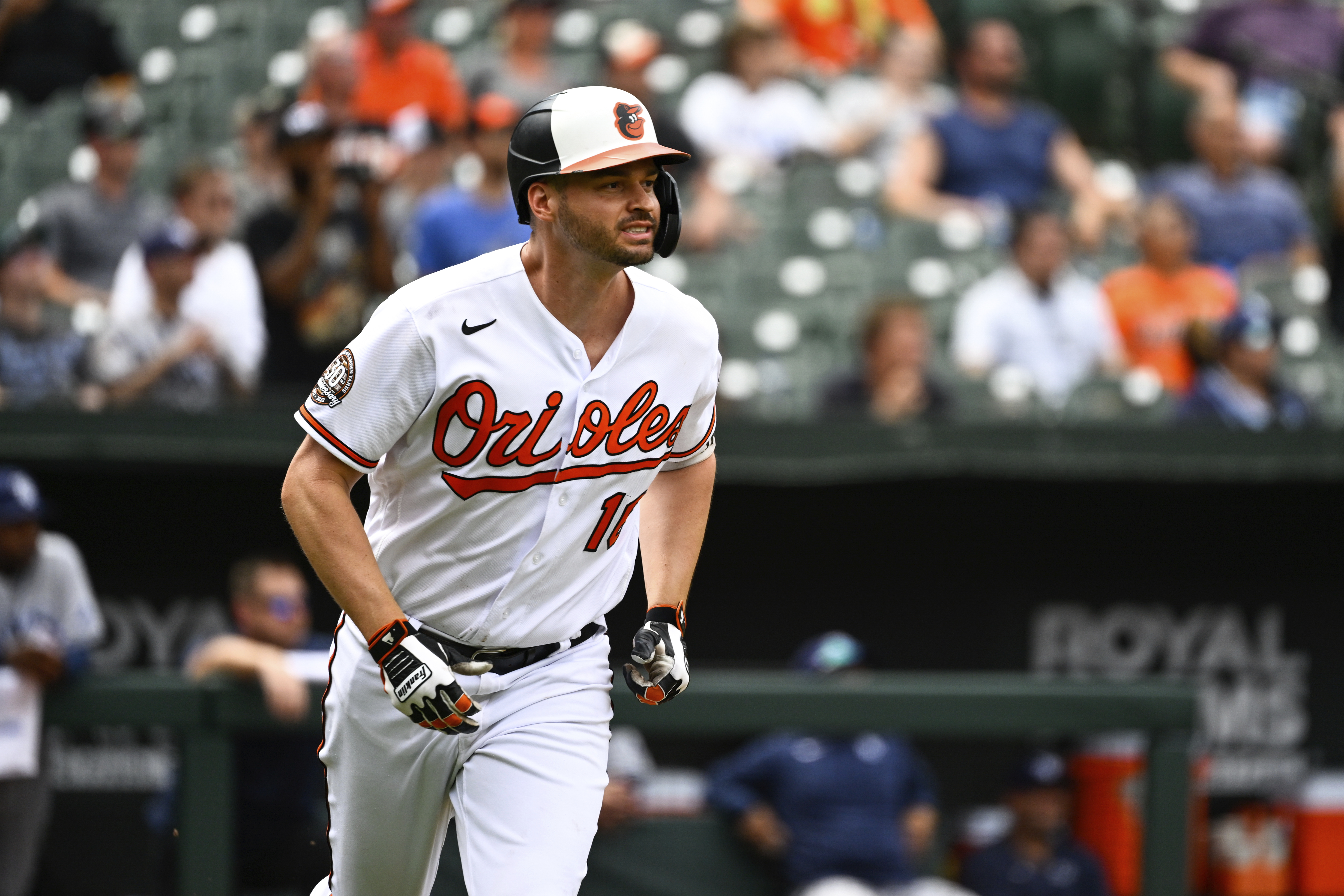 Baltimore Orioles designated hitter Trey Mancini watches his inside the park home run hit against Tampa Bay Rays relief pitcher Shawn Armstrong during the eighth inning of a baseball game, Thursday, July 28, 2022, in Baltimore. 