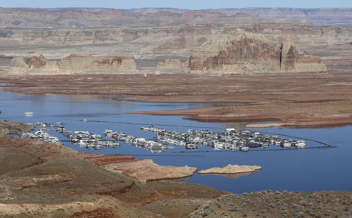 Low water levels are pictured at the Wahweap Marina in Lake Powell in Wahweap, Ariz., on March 28, 2021.