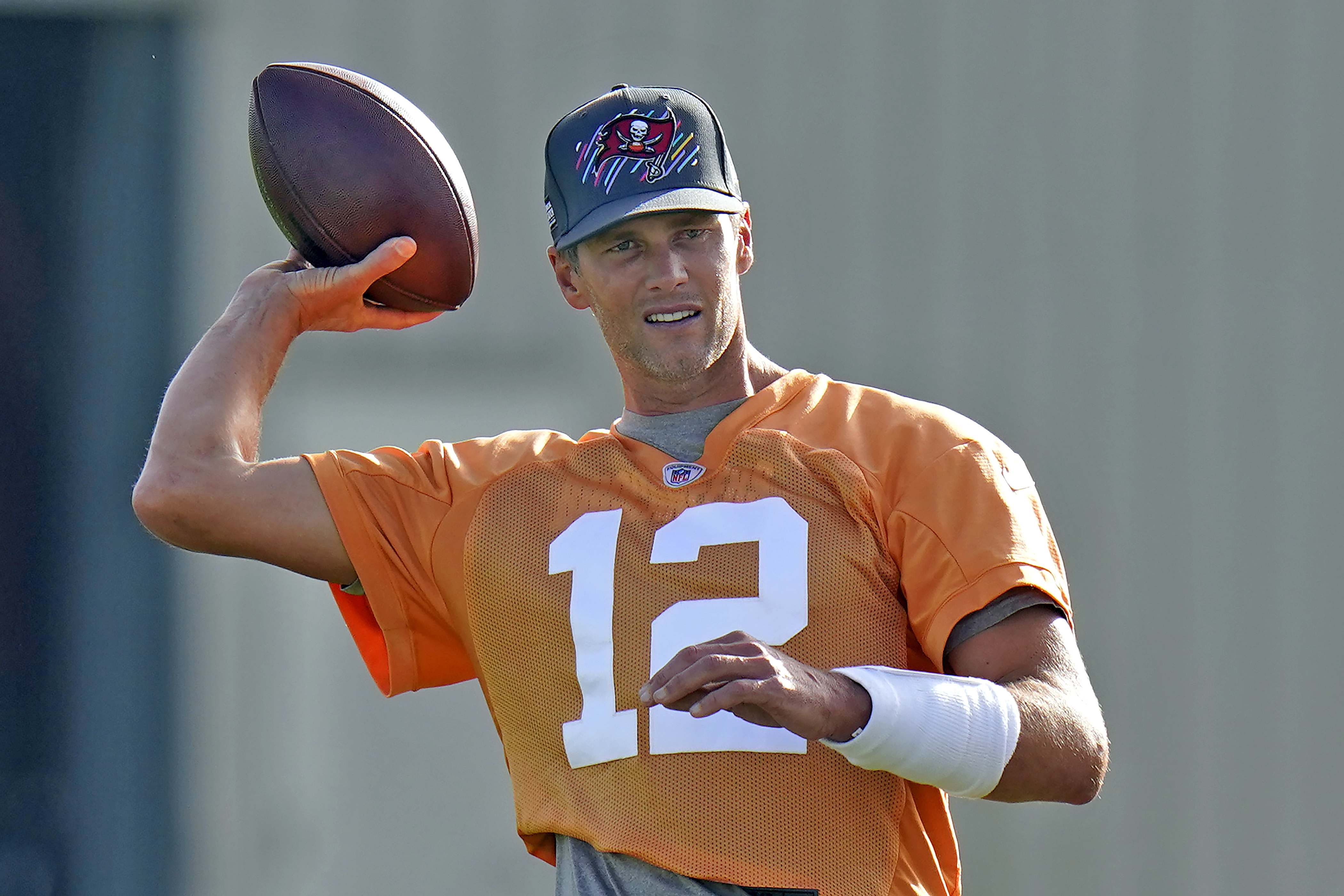 Tampa Bay Buccaneers quarterback Tom Brady throws a pass during NFL football training camp, Thursday, July 28, 2022, in Tampa, Fla. 