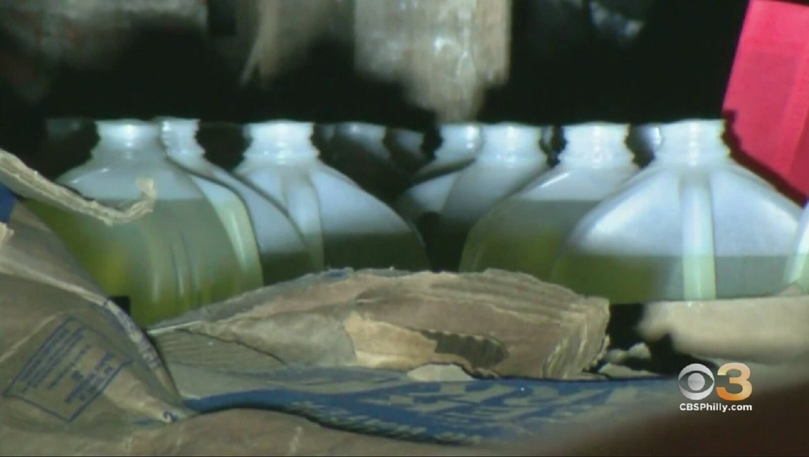 Police are investigating a hazmat situation after more than 100 plastic milk jugs filled with gasoline were found inside an abandoned home in West Philadelphia.