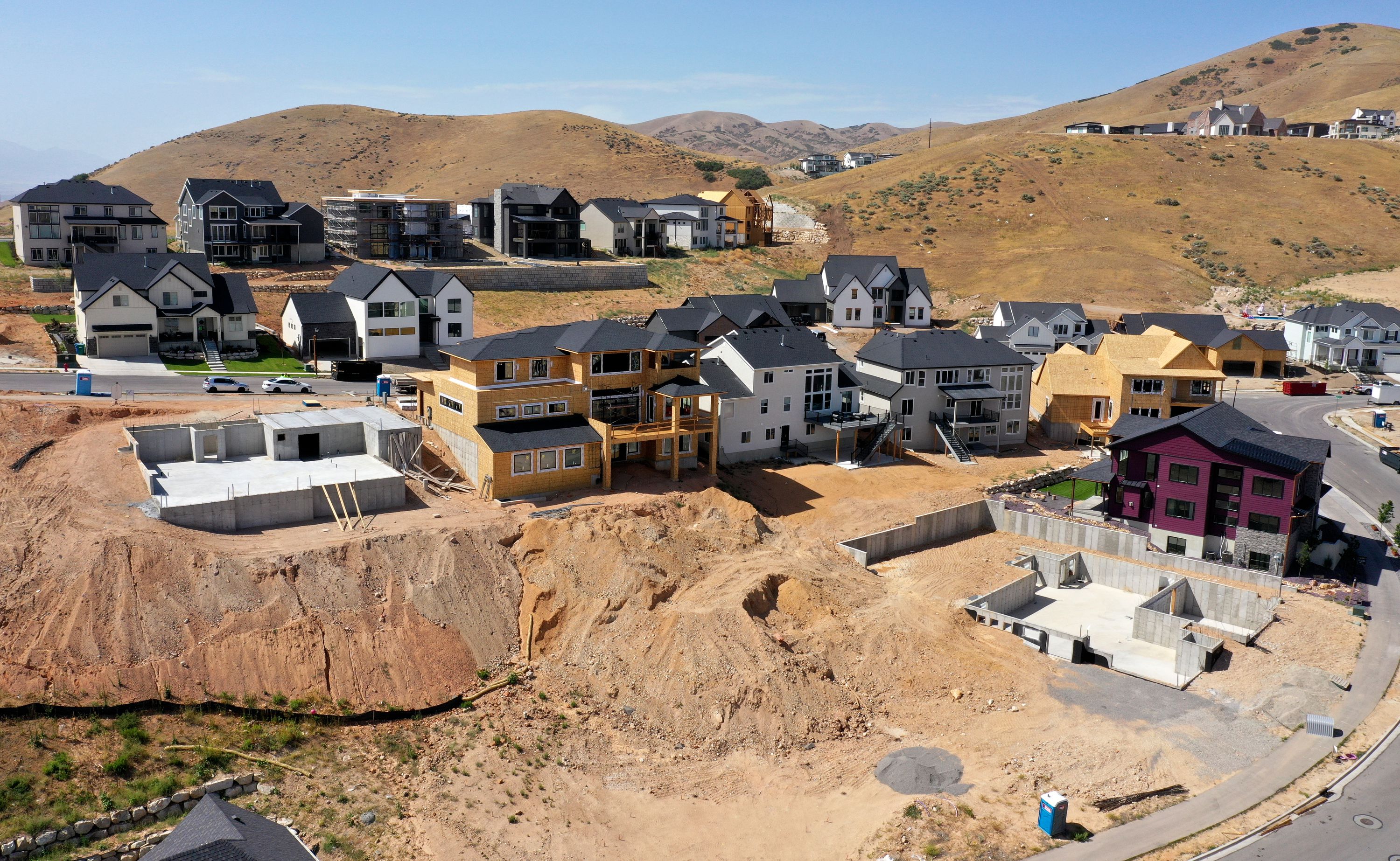 Single-family homes under construction in the Lakeview Estates community in Lehi are pictured on July 19. Economists are split on if the U.S. is in a housing recession.