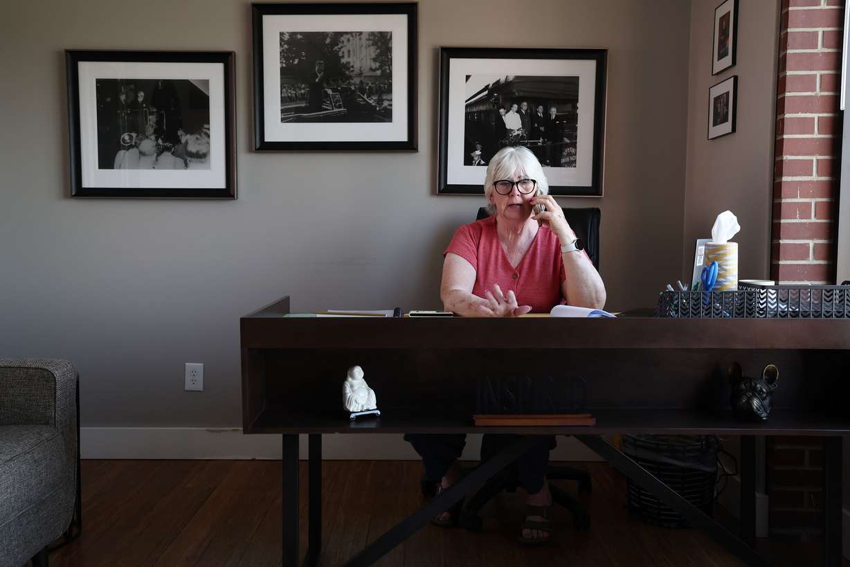 Diane Lewis, chairwoman of the Utah Democratic Party, talks on her phone inside her office at the party headquarters in Salt Lake City on July 26. Employees of the Utah Democratic Party and Salt Lake County Democratic Party have officially unionized.