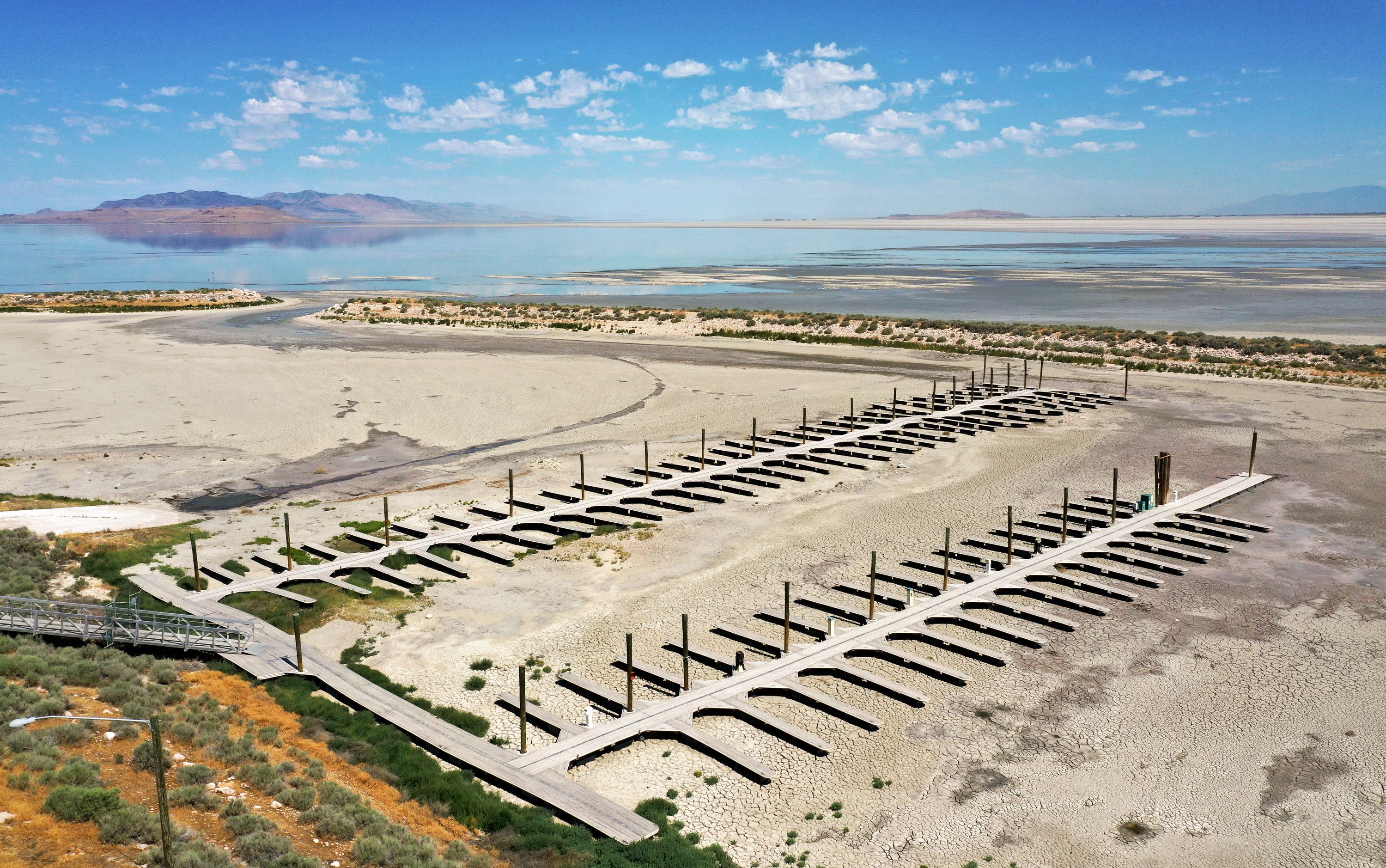 Record low water levels are seen in the Great Salt Lake by the Antelope Island marina on July 22. State leaders are working on solutions to help restore the lake.