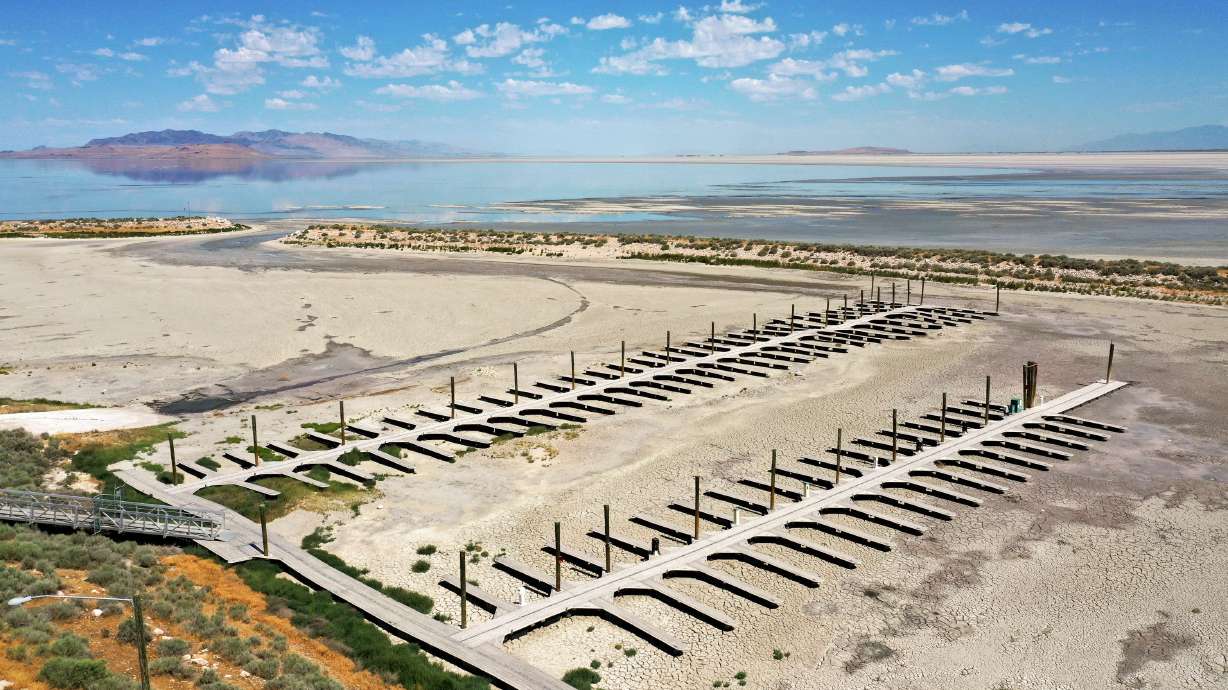 Record low water levels are seen in the Great Salt Lake by the Antelope Island marina on July 22. State leaders are working on solutions to help restore the lake.
