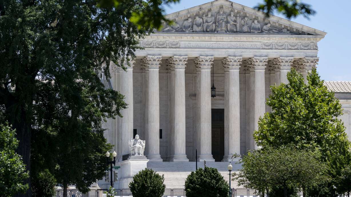 The Supreme Court is seen on Capitol Hill in Washington, July 14, 2022. The Supreme Court ruling expanding gun rights threatens to upend firearms restrictions across the country as activists wage court battles over everything from bans on AR-15-style guns to age limits.