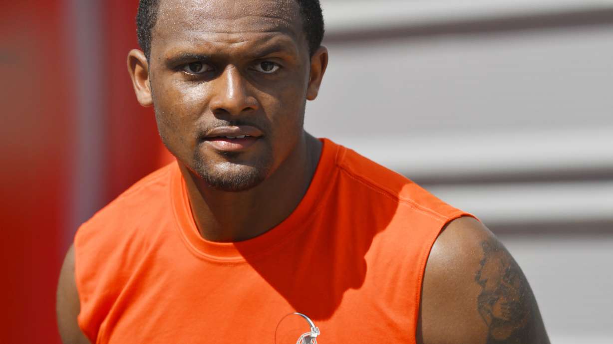 Cleveland Browns quarterback Deshaun Watson walks off the field after the NFL football team's training camp, Wednesday, Aug. 3, 2022, in Berea, Ohio. The NFL is appealing a disciplinary officer’s decision to suspend Watson for six games for violating the league’s personal conduct policy. The move gives Commissioner Roger Goodell or someone he designates authority to impose a stiffer penalty.