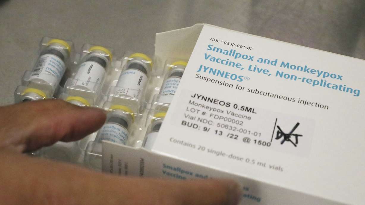 Jonathan Parducho, a pharmacist, removes a tray of vials of of the Jynneos vaccine for monkeypox from a box containing 20 doses, in the vaccine hub at Zuckerberg San Francisco General Hospital, Friday, in San Francisco.