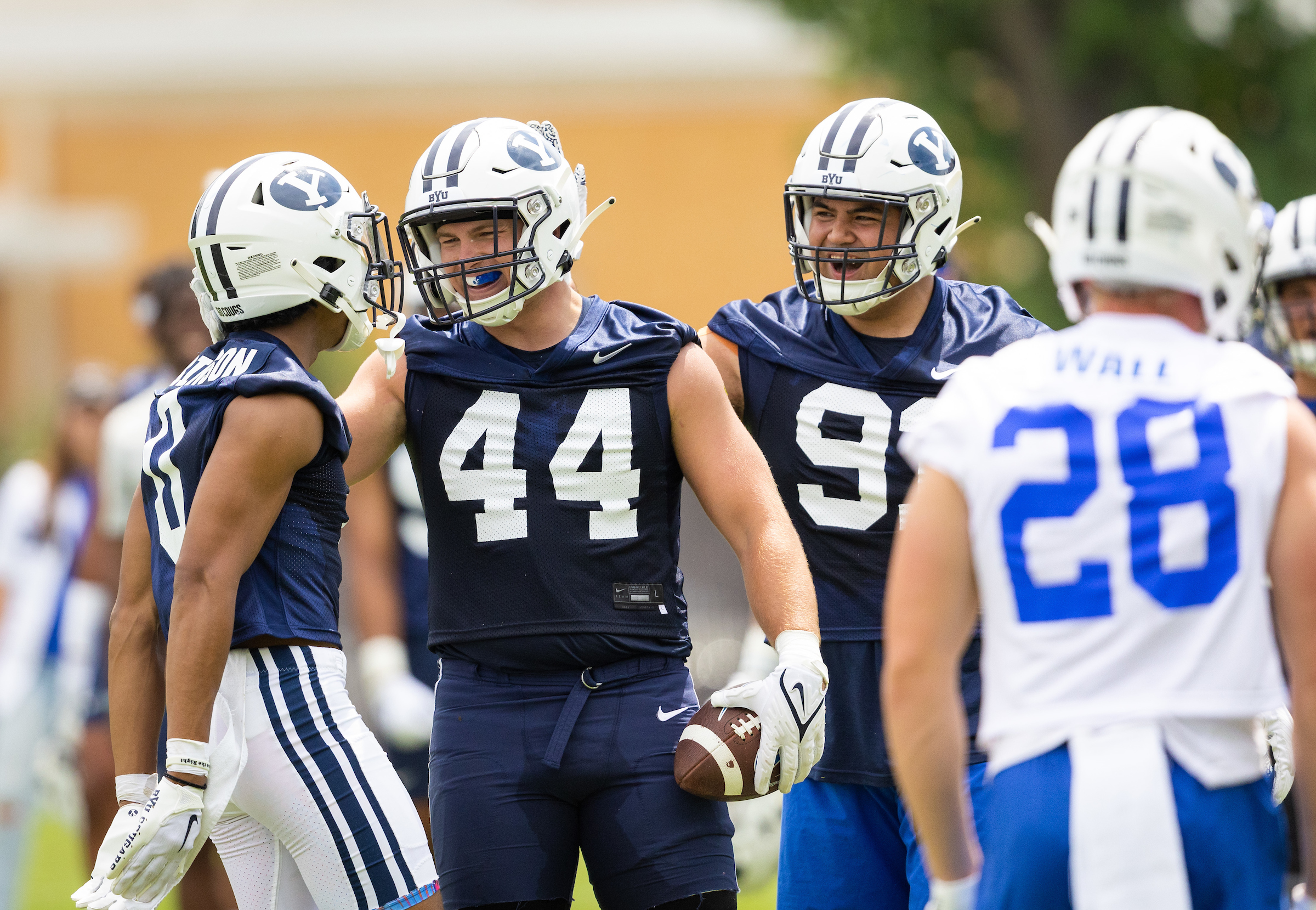 BYU linebacker Michael Daley celebrates an interception on the first day of training camp, Thursday, Aug. 4, 2022 in Provo.
