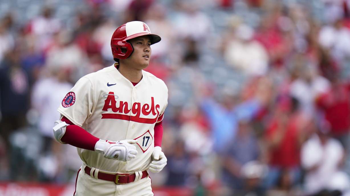 Los Angeles Angels' Shohei Ohtani runs the bases after hitting a home run against the Oakland Athletics, his second homer of the baseball game, during the seventh inning Thursday, Aug. 4, 2022, in Anaheim, Calif.