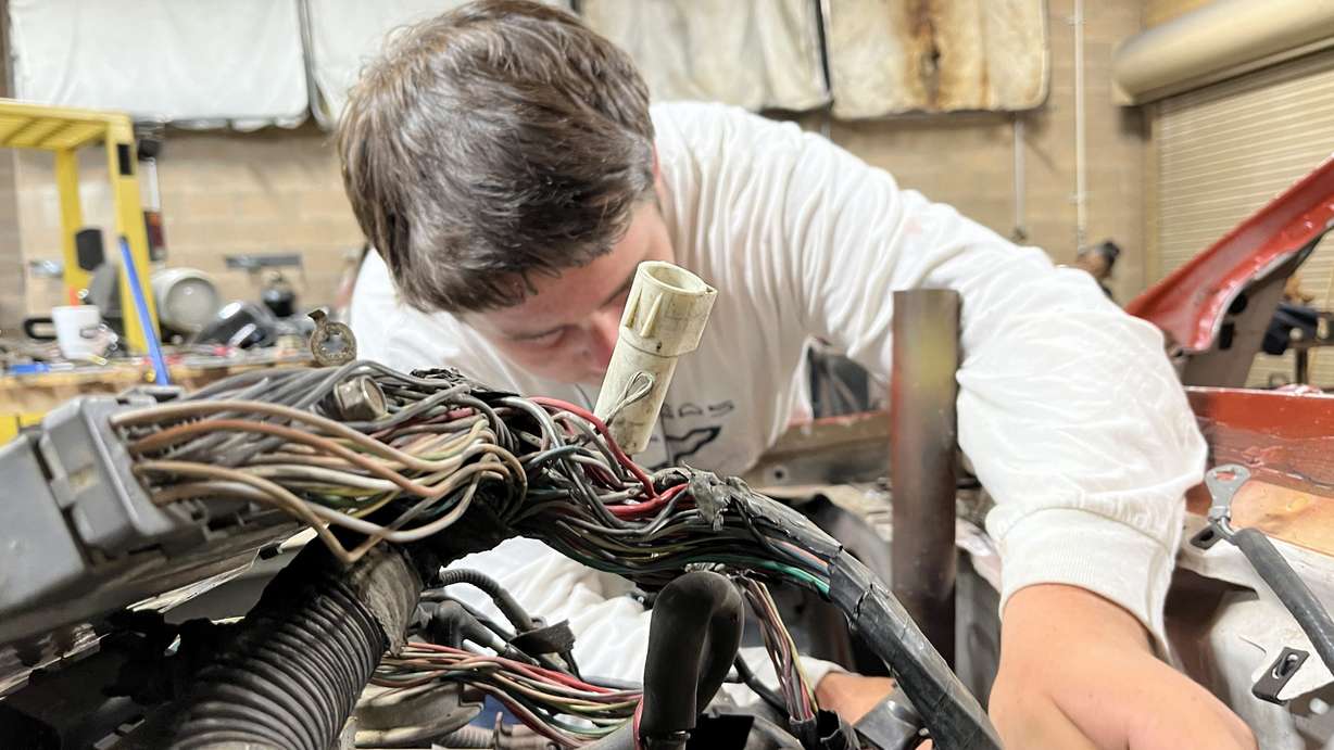 Some classmates from Maple Mountain High School in Spanish Fork spent the summer learning all about cars. Mechanic Tyler Warner donated cars for them to work on, which will be part of a demolition derby Aug. 13.
