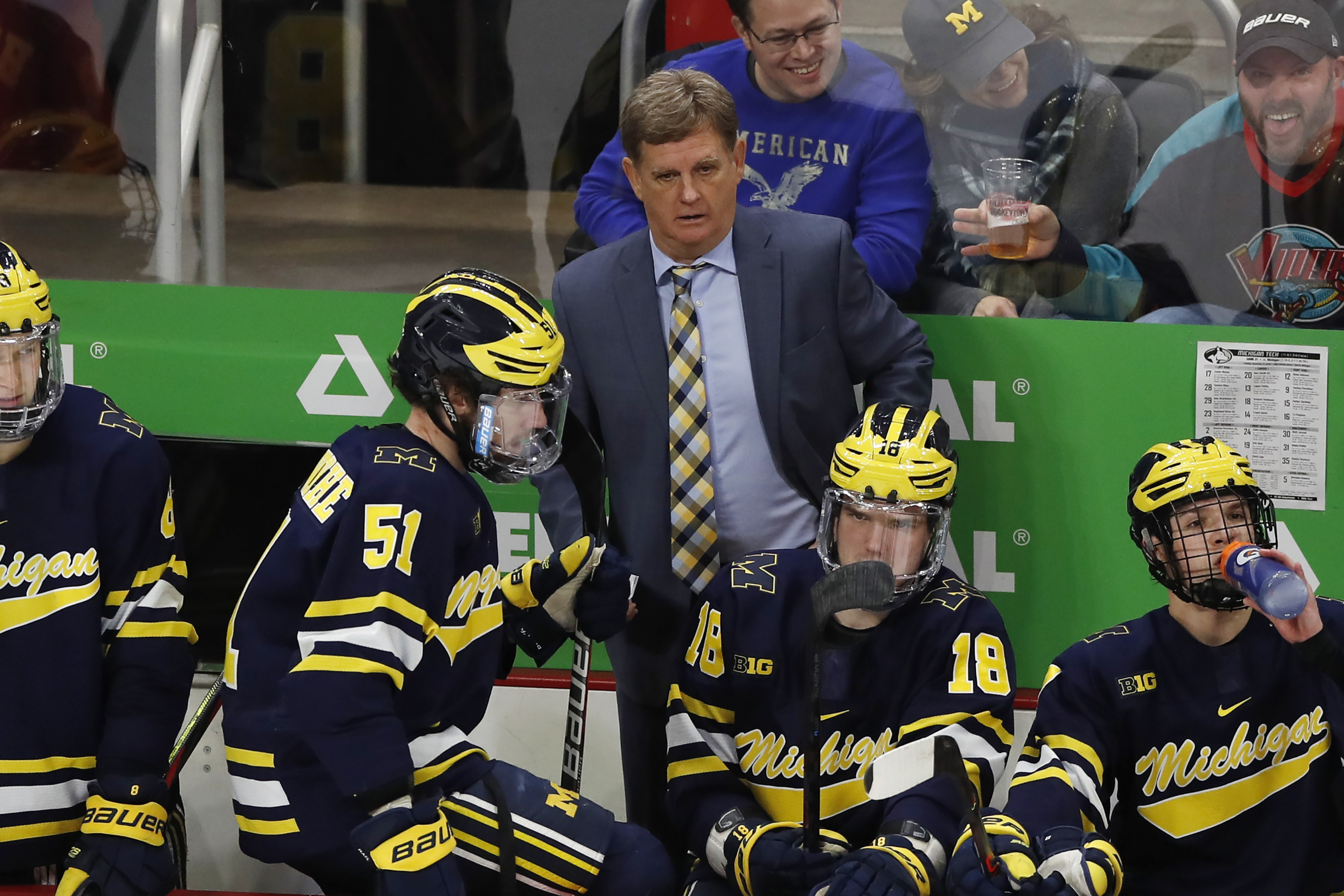 FILE - Michigan hockey coach Mel Pearson is seen during the second period of the Great Lakes Invitational college hockey championship game, Tuesday, Dec. 31, 2019, in Detroit. The University of Michigan has cut ties with hockey coach Mel Pearson. The school announced its decision on Friday, Aug. 5, 2022 Pearson's contract expired after last season and he had been an at-will employee, pending a review of the program.