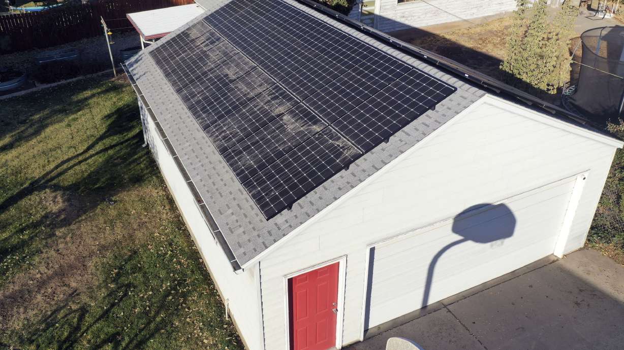 Solar panels cover the garage of a Salt Lake City home on Nov. 2, 2020. Salt Lake City announced a new program offering discount solar options for up to 50 eligible homeowners in the city.