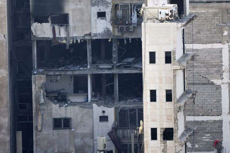 The damaged apartment of Taiseer al-Jabari, the Islamic Jihad commander for northern Gaza, following an Israeli airstrikes, in Gaza City, Friday. Palestinian officials say Israeli airstrikes on Gaza have killed several people, including a senior militant, and wounded 40 others.