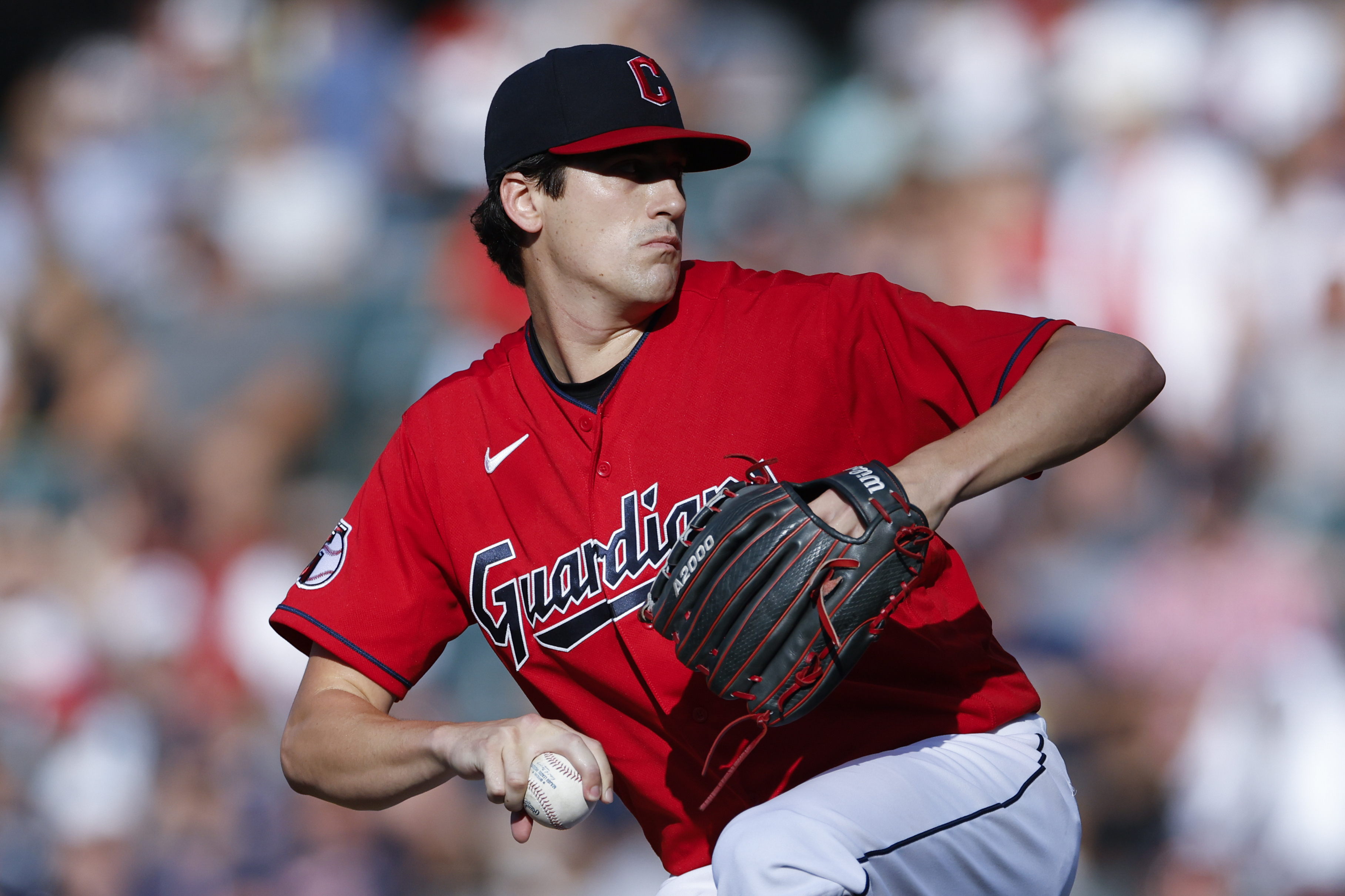 Cleveland Guardians starting pitcher Cal Quantrill winds up during the first inning of the team's baseball game against the Houston Astros, Saturday, Aug. 6, 2022, in Cleveland. 
