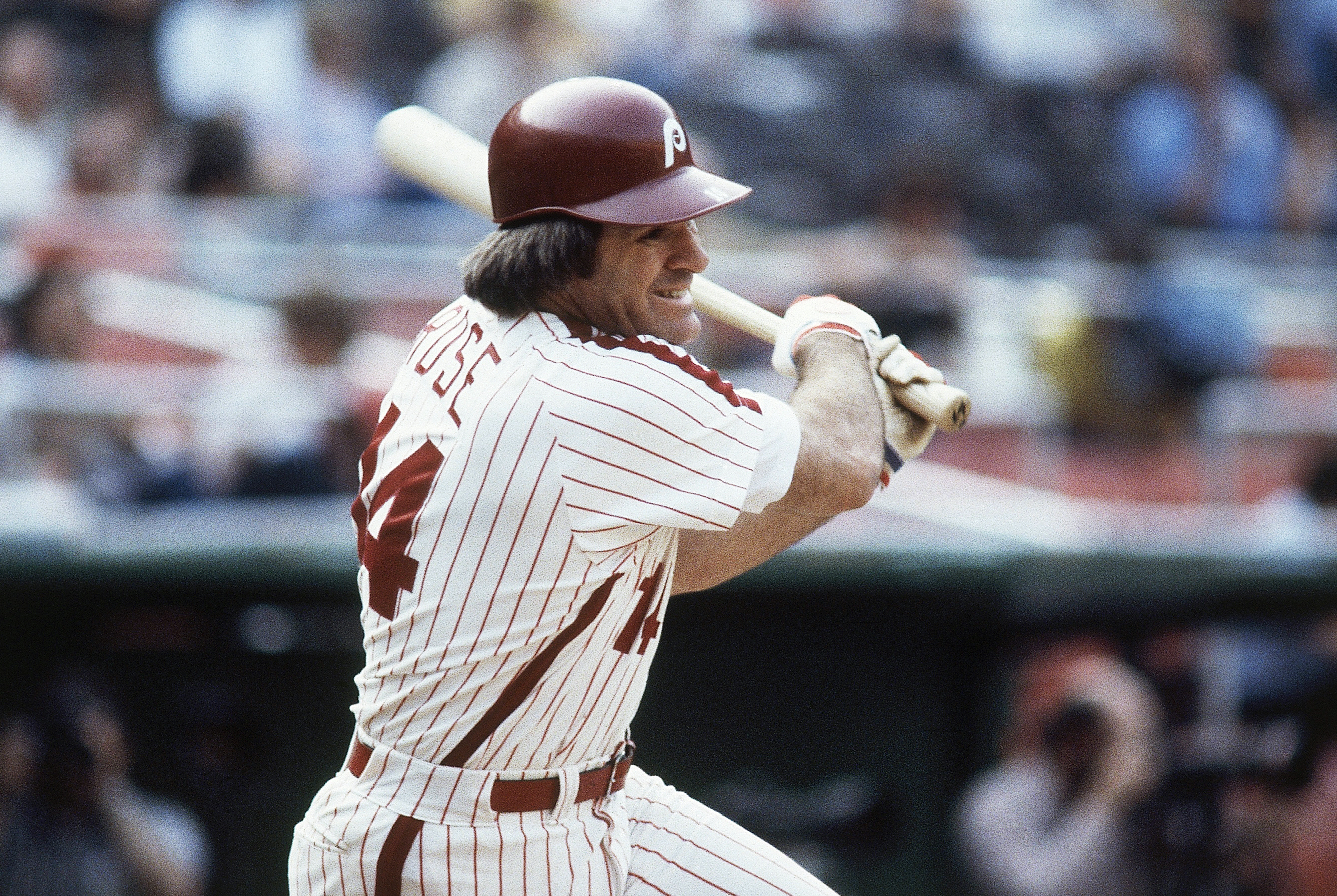 FILE - Philadelphia Phillies' Pete Rose bats during a 1980 baseball game. Rose will make an appearance on the field in Philadelphia next month. Baseball’s career hits leader will be part of Phillies alumni weekend, and will be introduced on the field alongside many former teammates from the 1980 World Series championship team on Aug. 7. 